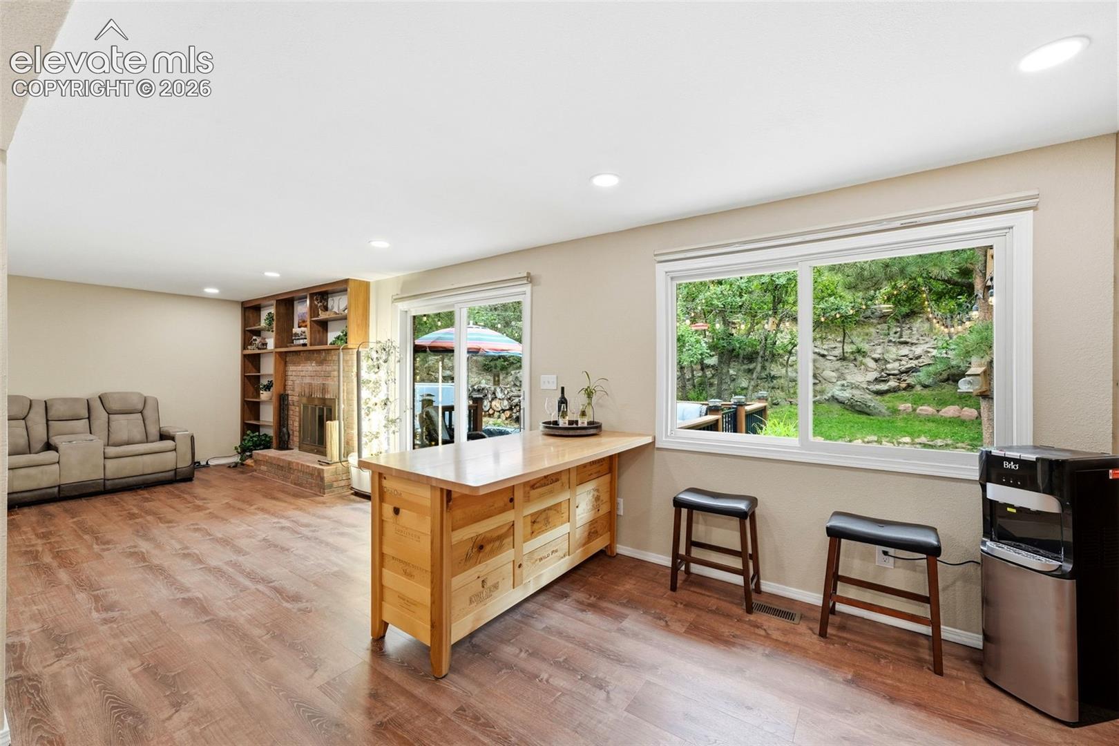 Movable island, big windows and walkout to the back deck