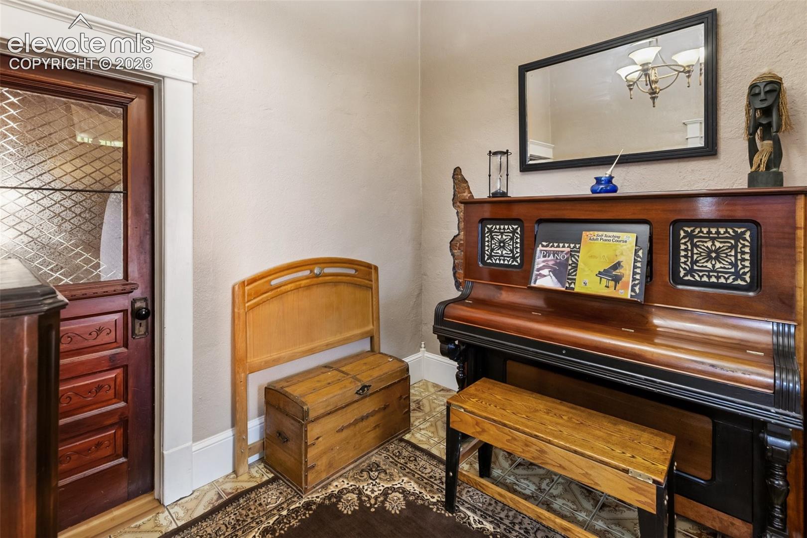 another view of the Foyer or Piano Room. You can the window in the door into the Second Bedroom
