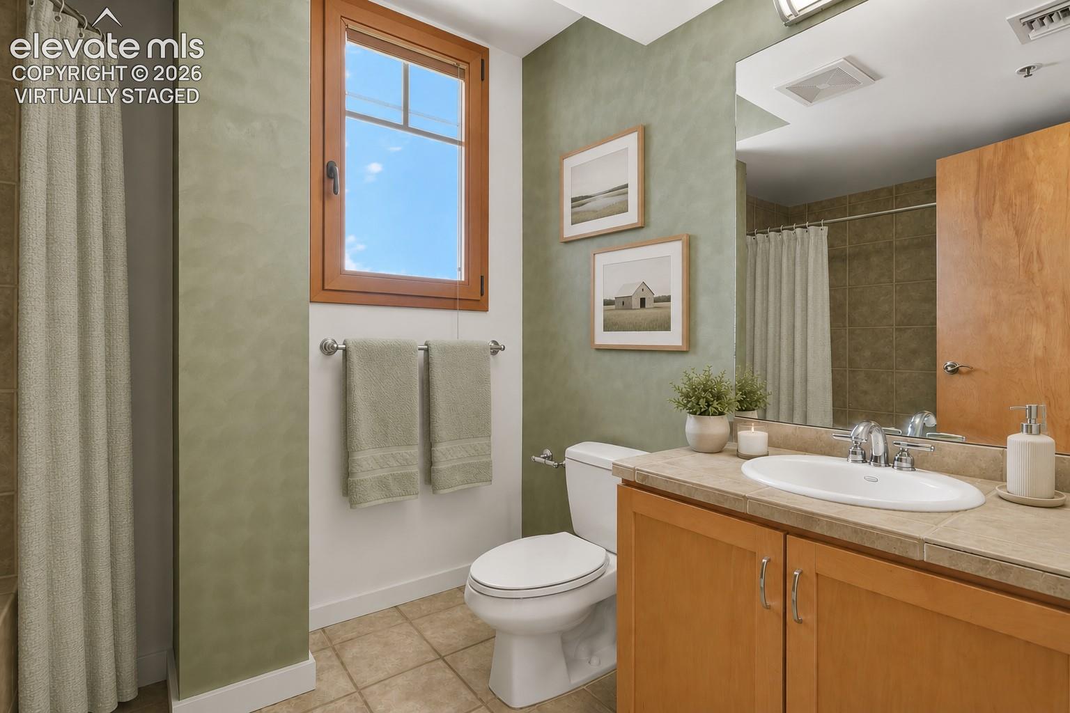 Main level guest bath. Virtually Staged