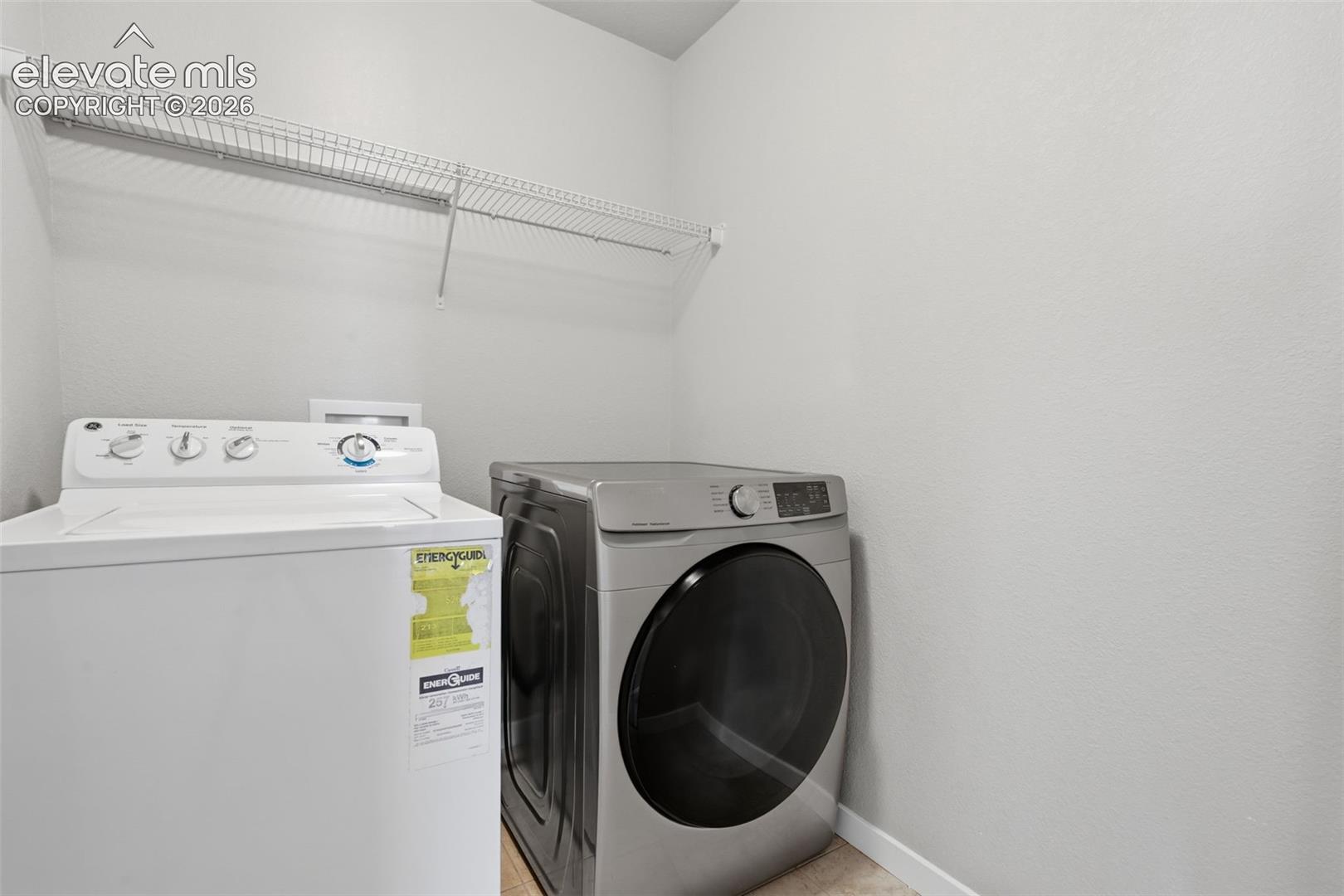 Laundry is conveniently located on the same level as four of the home's five bedrooms.