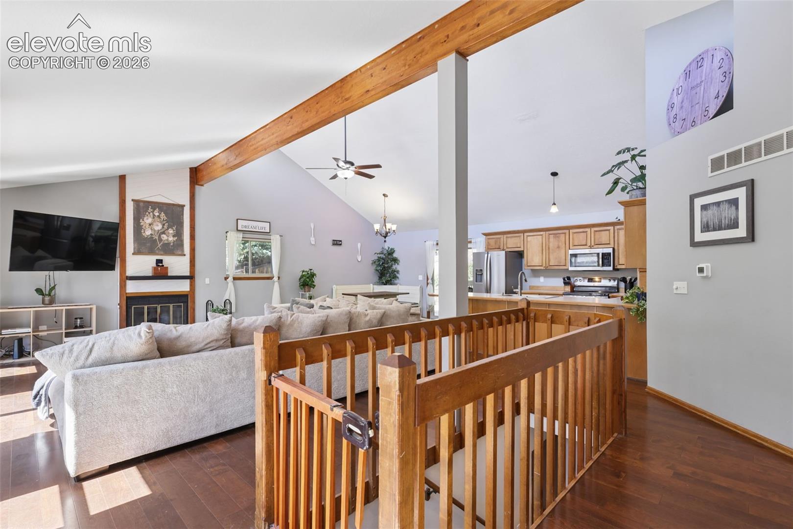 Vaulted ceilings with exposed wood beams