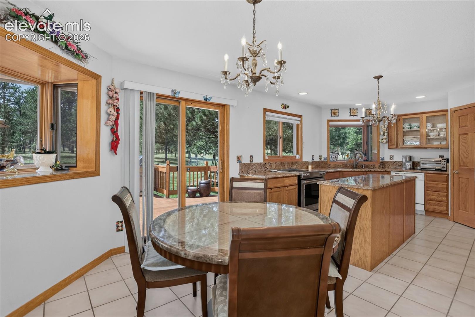 Breakfast area in kitchen with walk out to back deck.Breakfast area in kitchen with walk out to back deck.