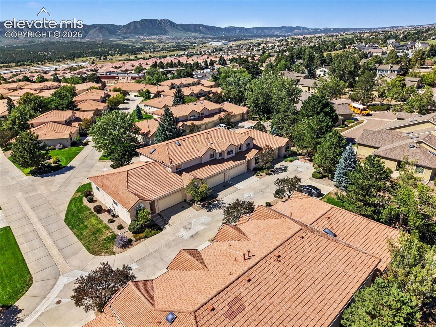 Residential community featuring stucco exteriors and tile roofing