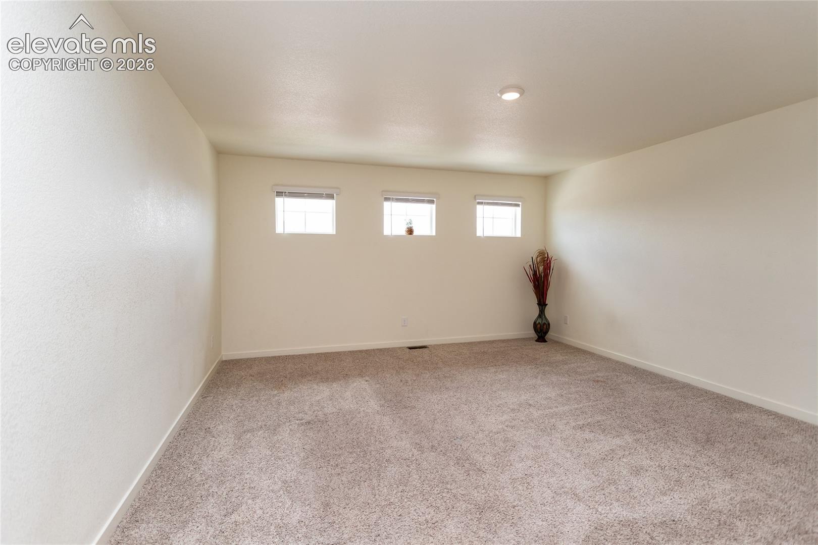 As you go upstairs, you are greeted by a huge loft area offering views of Colorado sunsets!