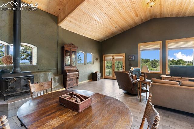 Massive great room with an open living style encompassing the kitchen, dining, and living room spaces. 