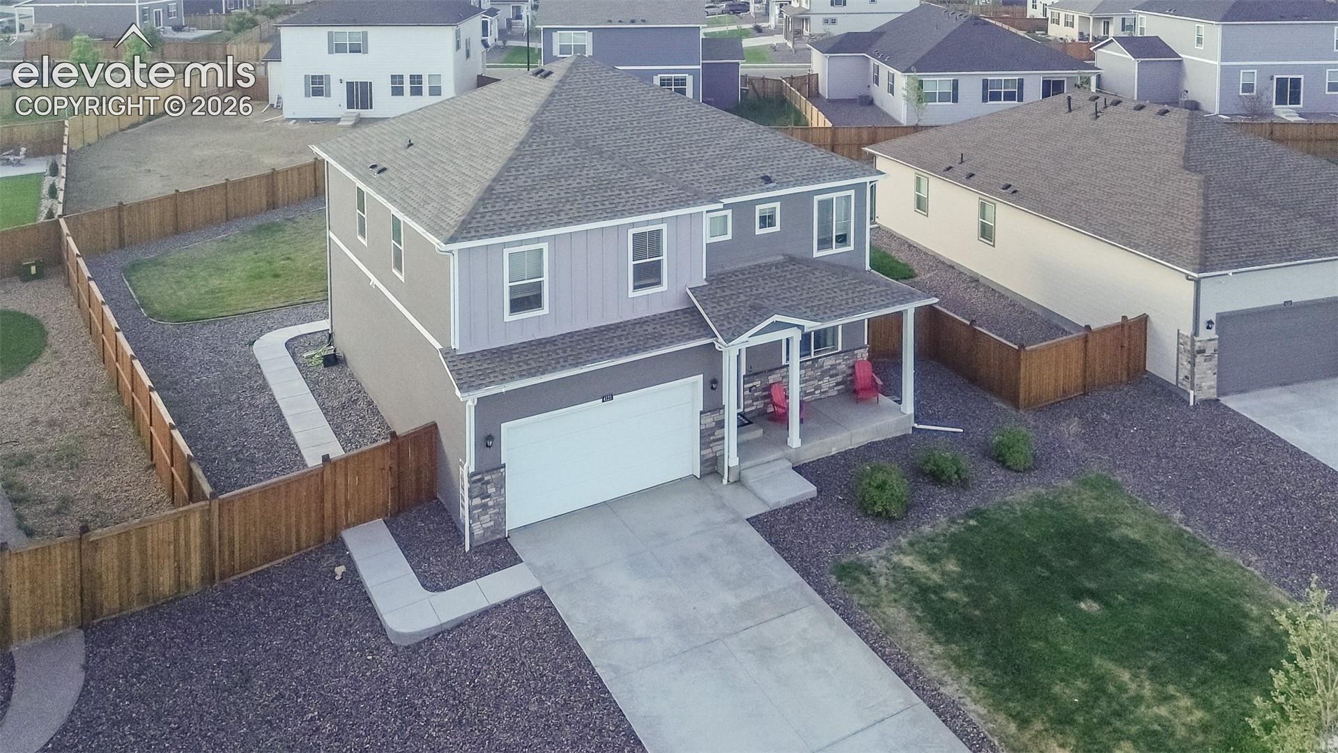 Aerial view of home and lot.