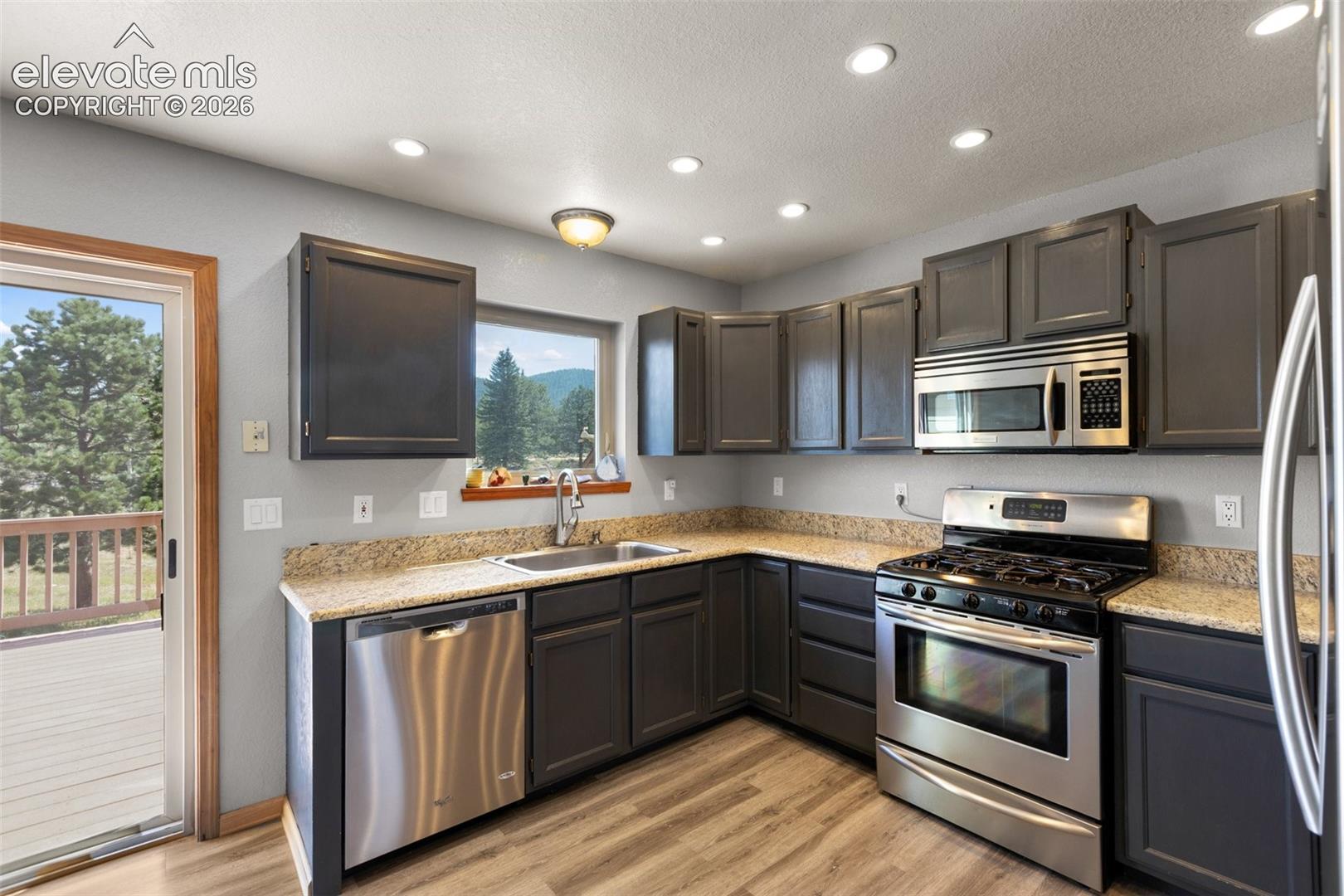 Kitchen with walk out. 