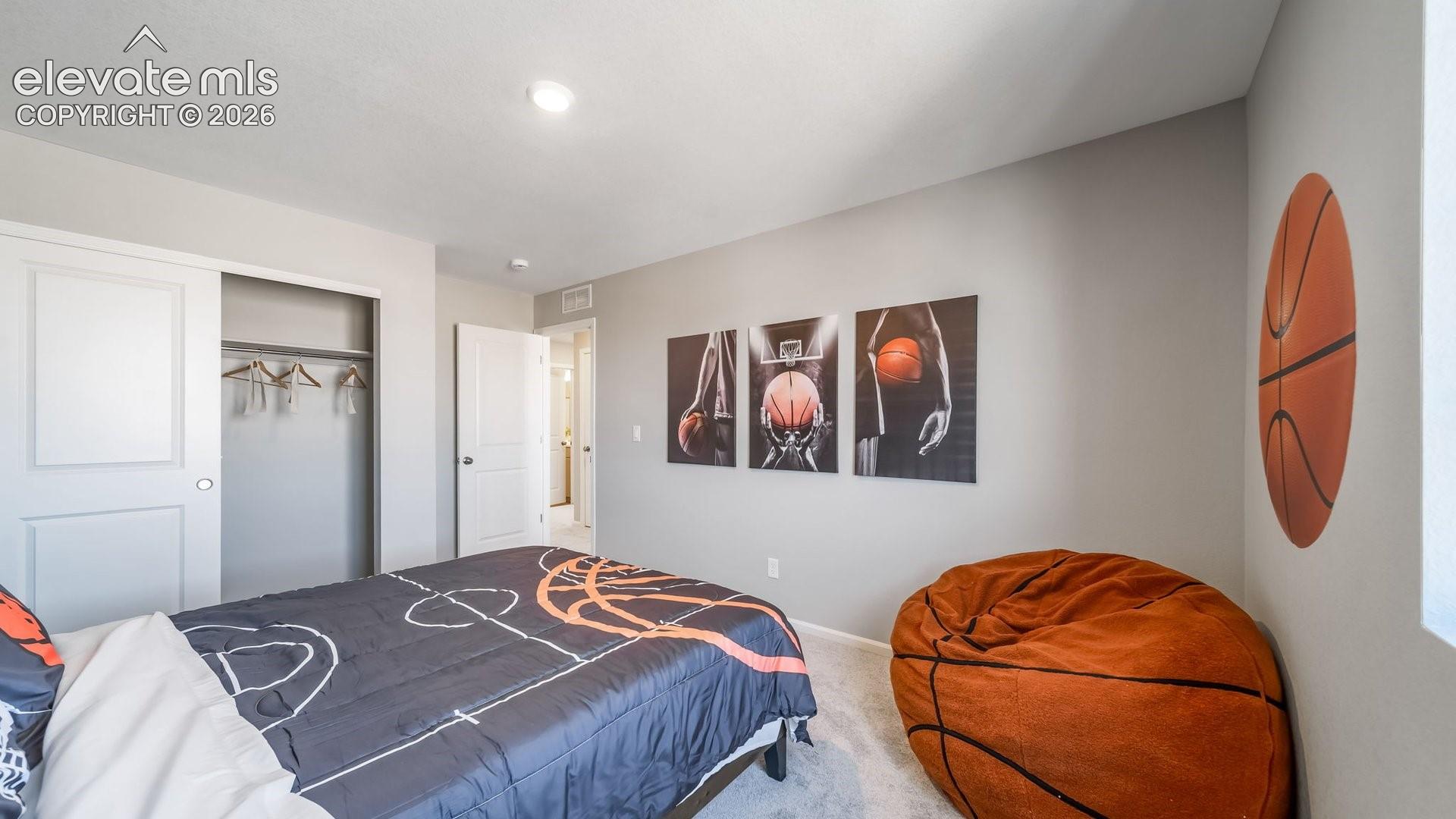 Recessed ceiling lighting, light gray wall paint, carpeting, double sliding closet doors, and interior door
*photos of a model home*