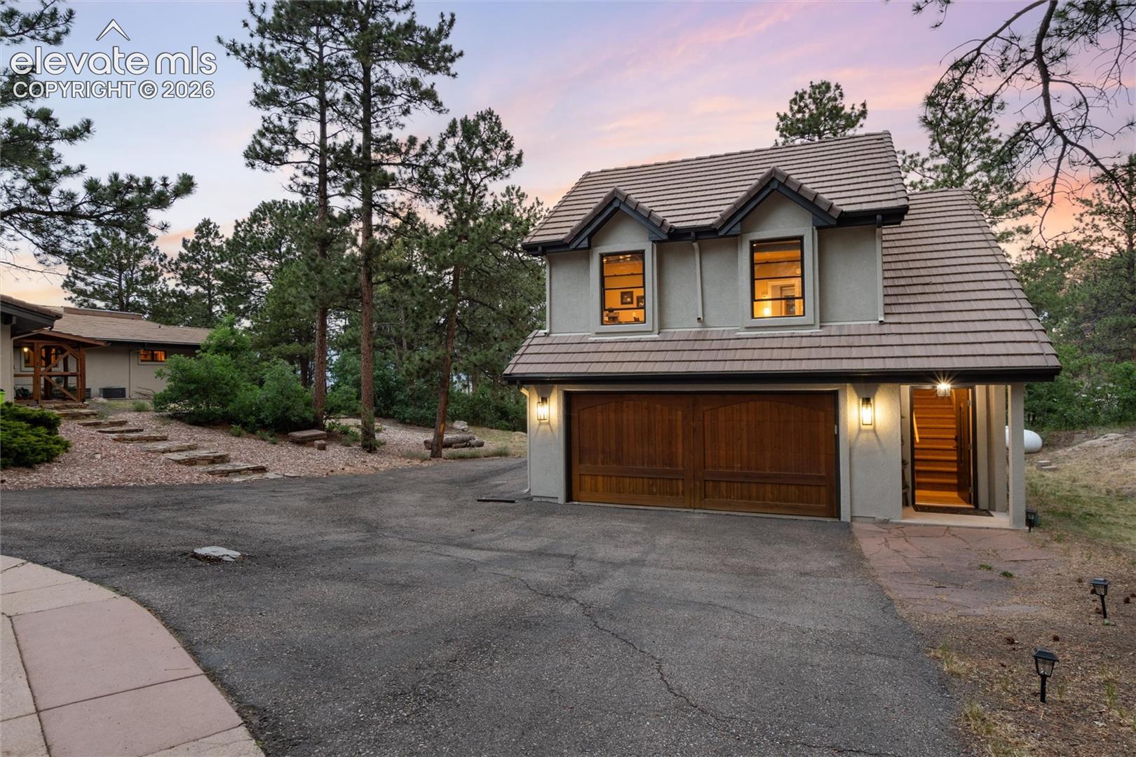 Carriage House with 2 car attached garage 