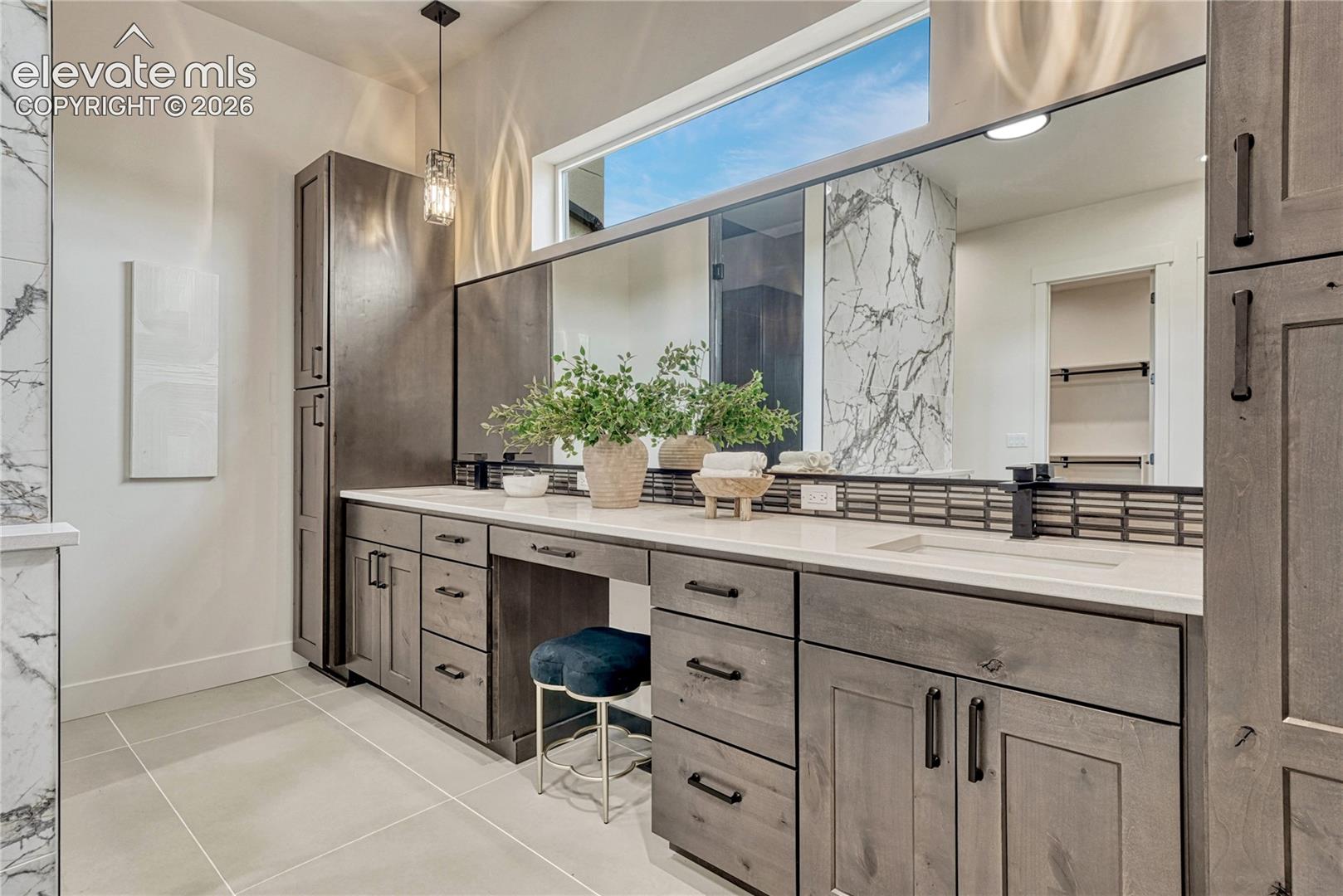 Natural light, ample storage and double vanity. 