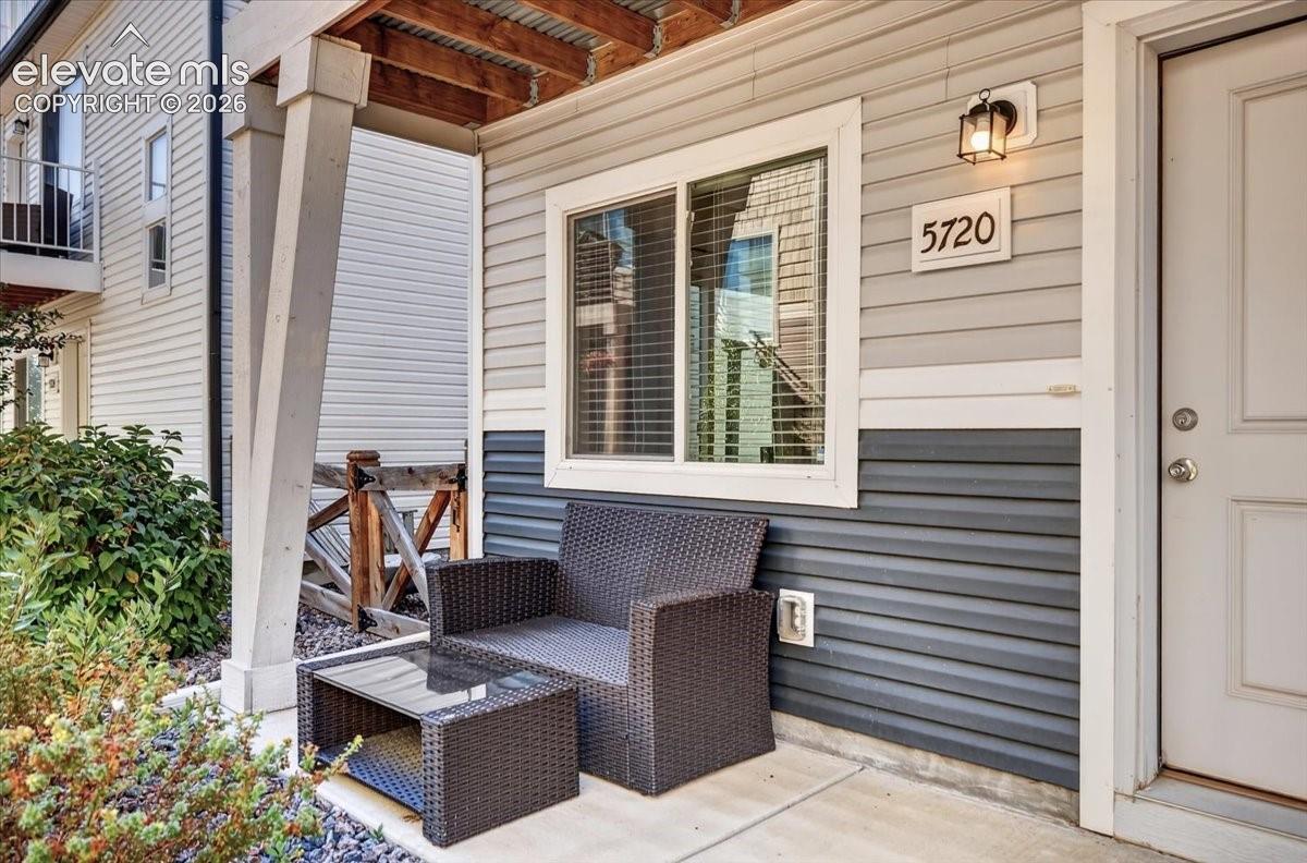 This home offers indoor/outdoor living with ease, starting with the front patio. 