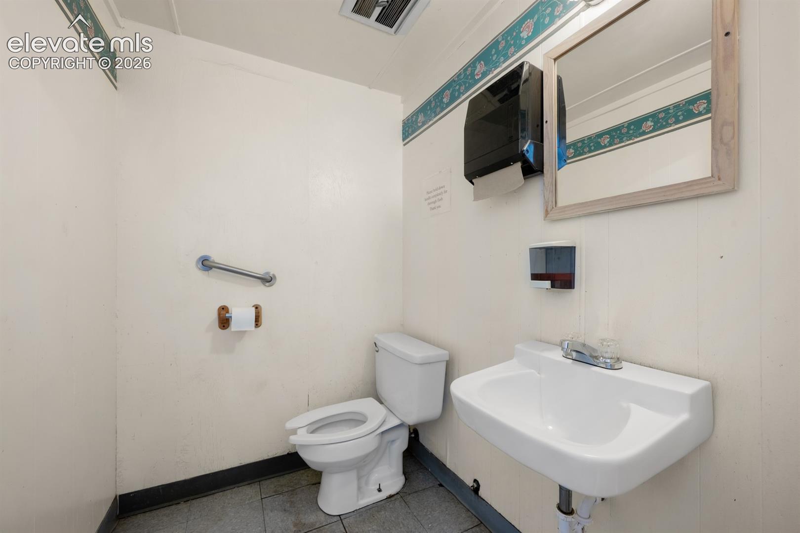 Public Bathroom in Laundromat