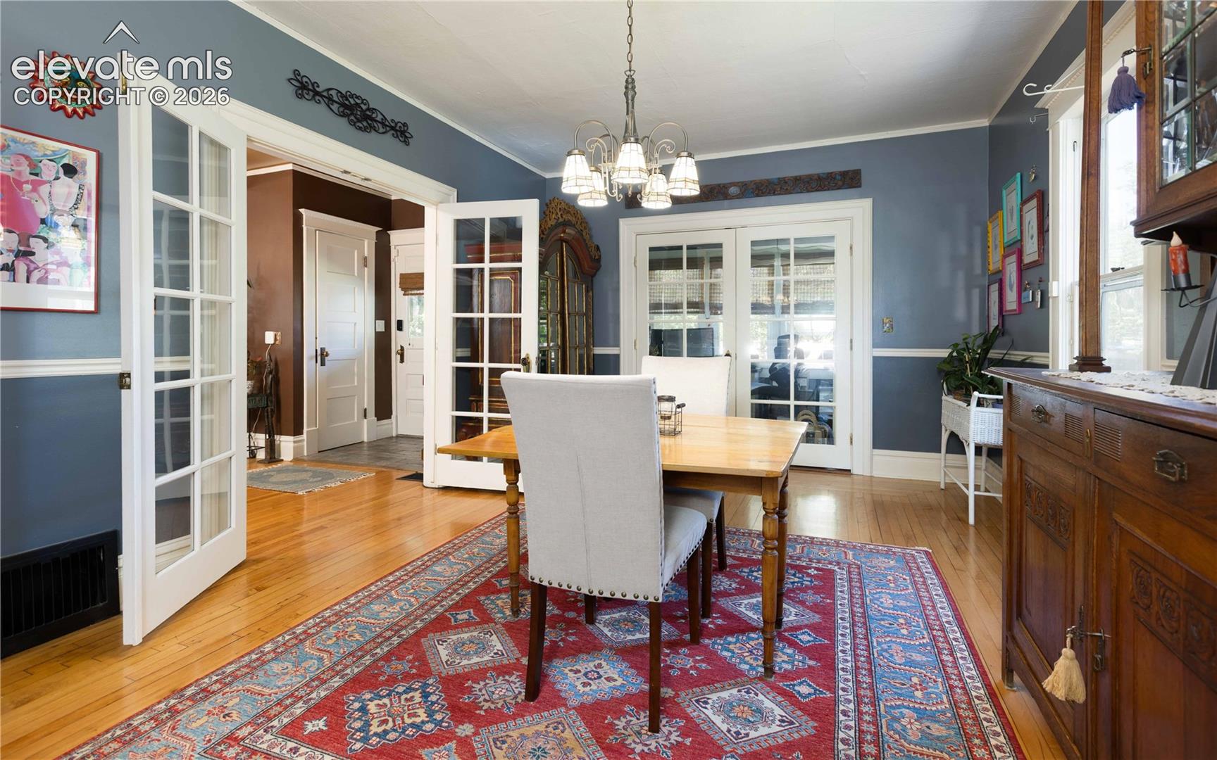 Large eat-in kitchen area with french doors to office