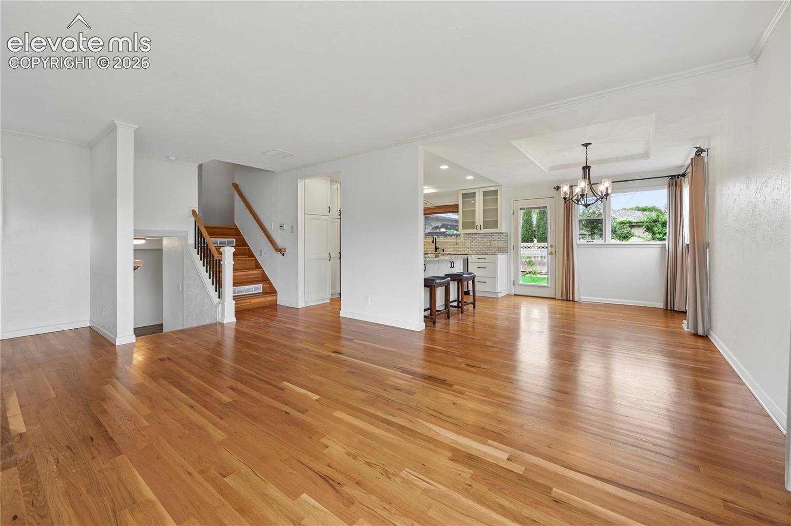 Living Room (Looking Towards Entry, Stairs and Kitchen & Dining Room)