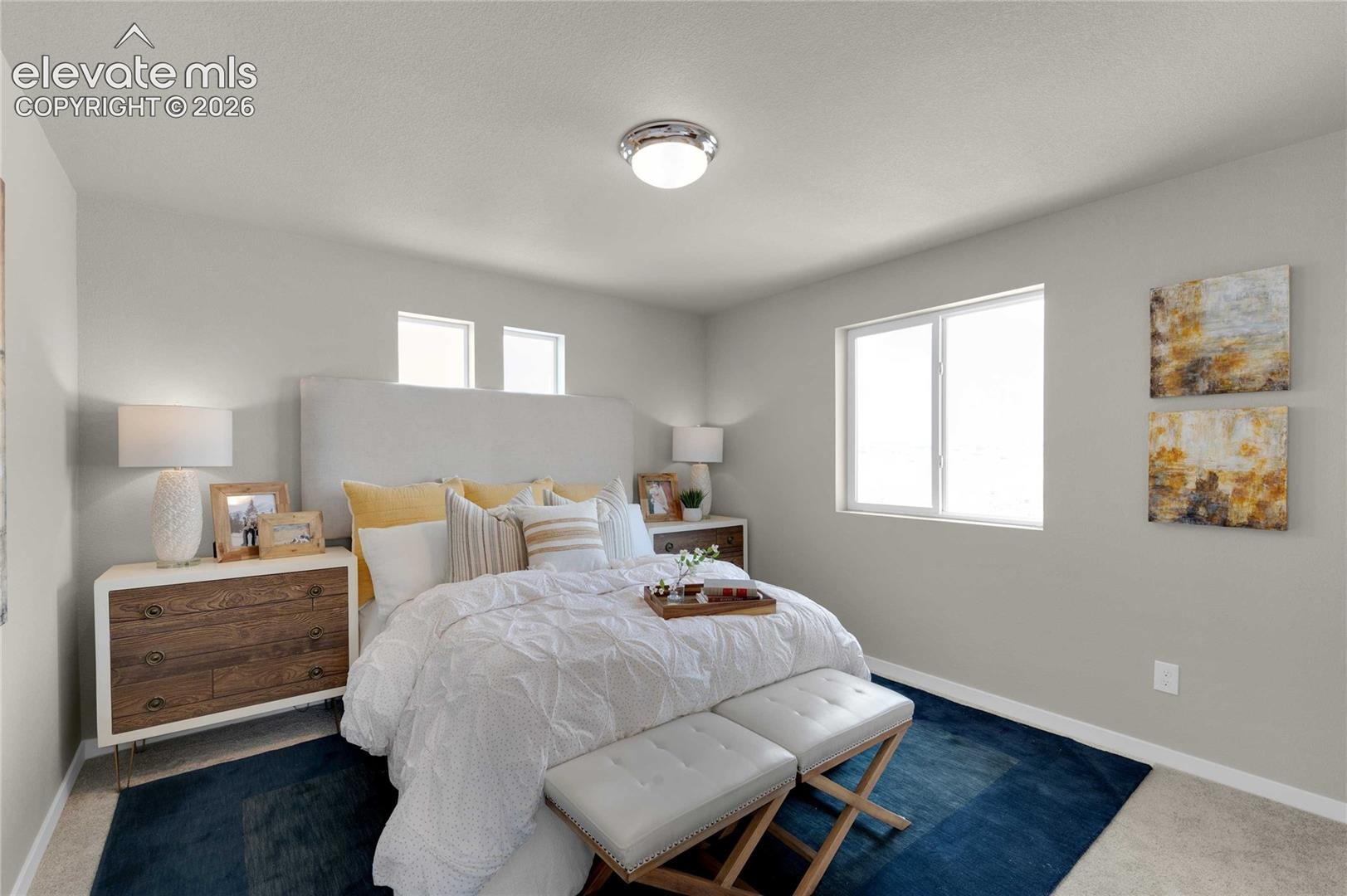 Recessed lighting, large window with natural light, two high windows, and light-colored walls
*photos of a model home*