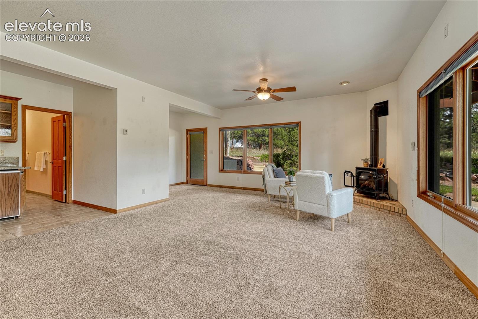 Rec room has room for a pool table and a sitting area. 
