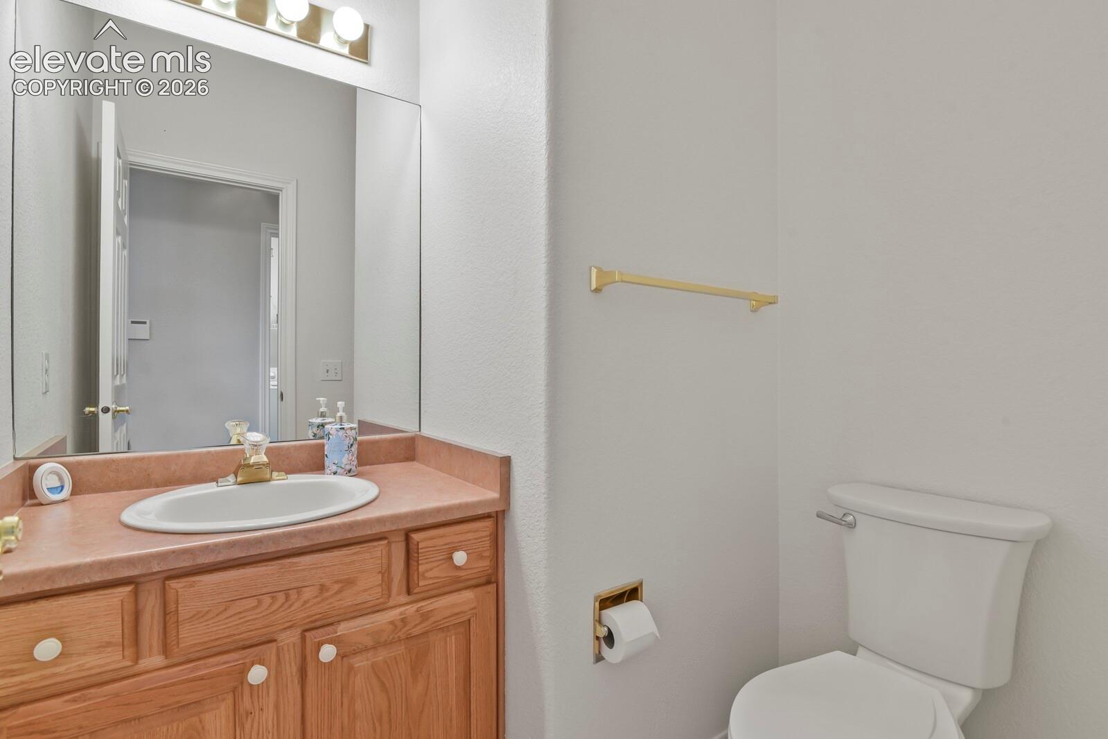 Main Level Powder Bathroom with NEW Lighting!