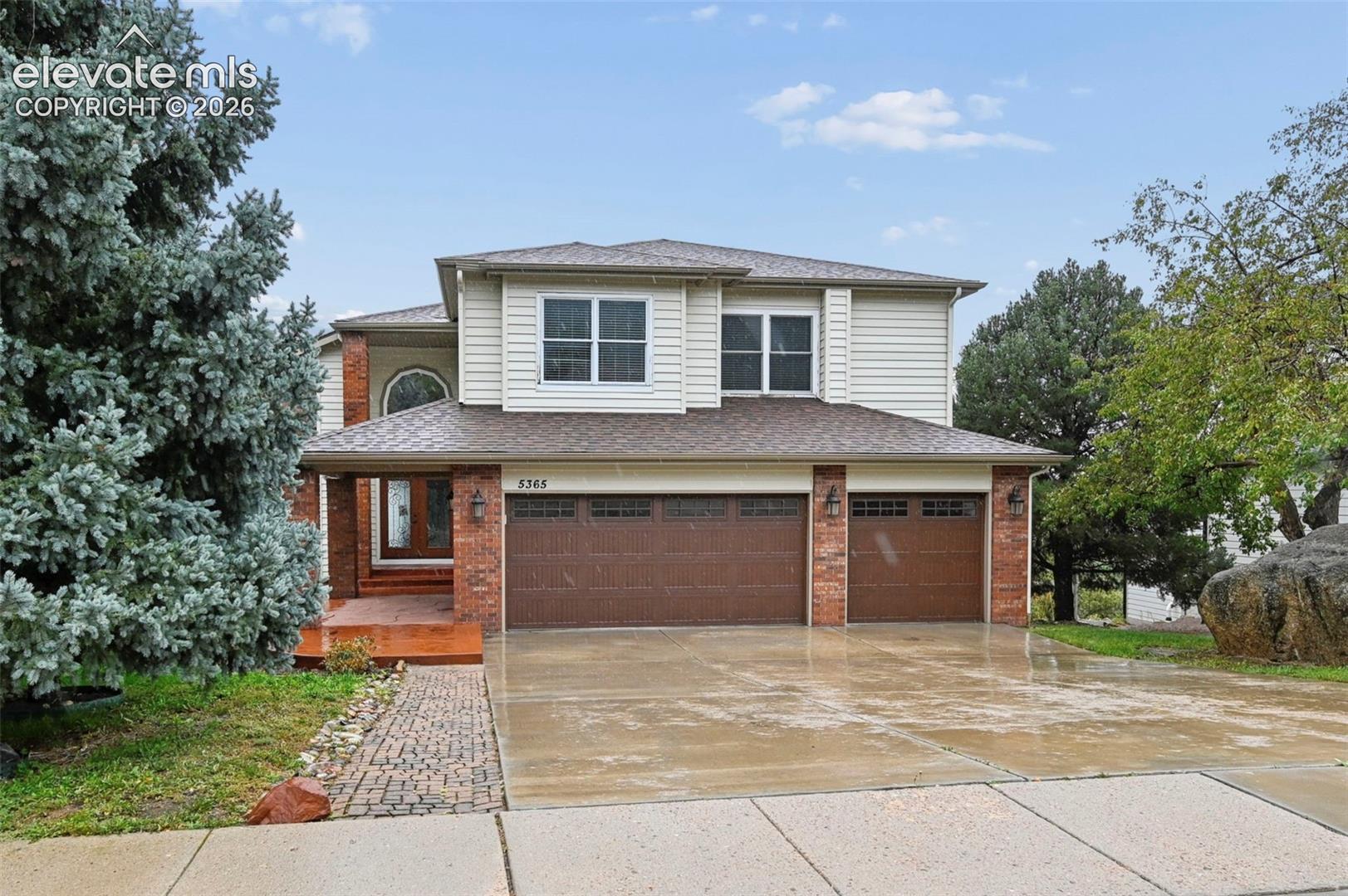 A rainy day won’t distract from the beauty of this home! 