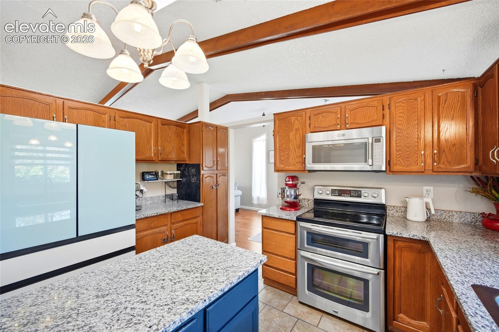 ALL NEWER APPLINCES AND TONS OF COUNTER TOPS AND CABINETS.  