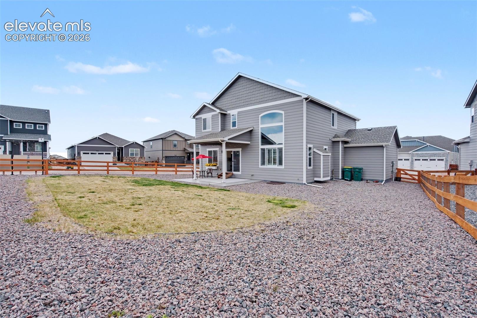 Gray siding exterior with a multi-story design