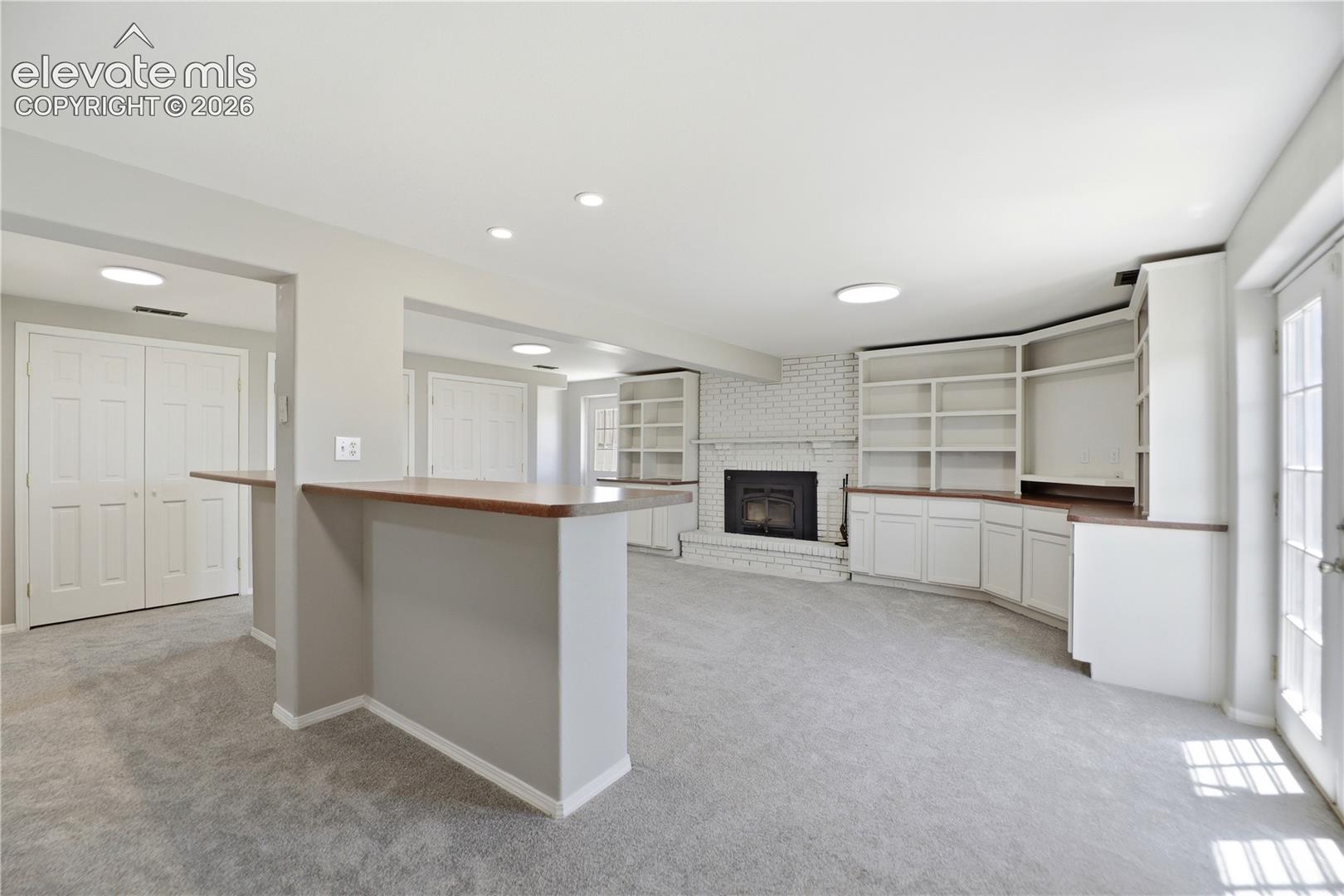 Carpet, Closets, Built Ins, Fireplace, Dry Bar