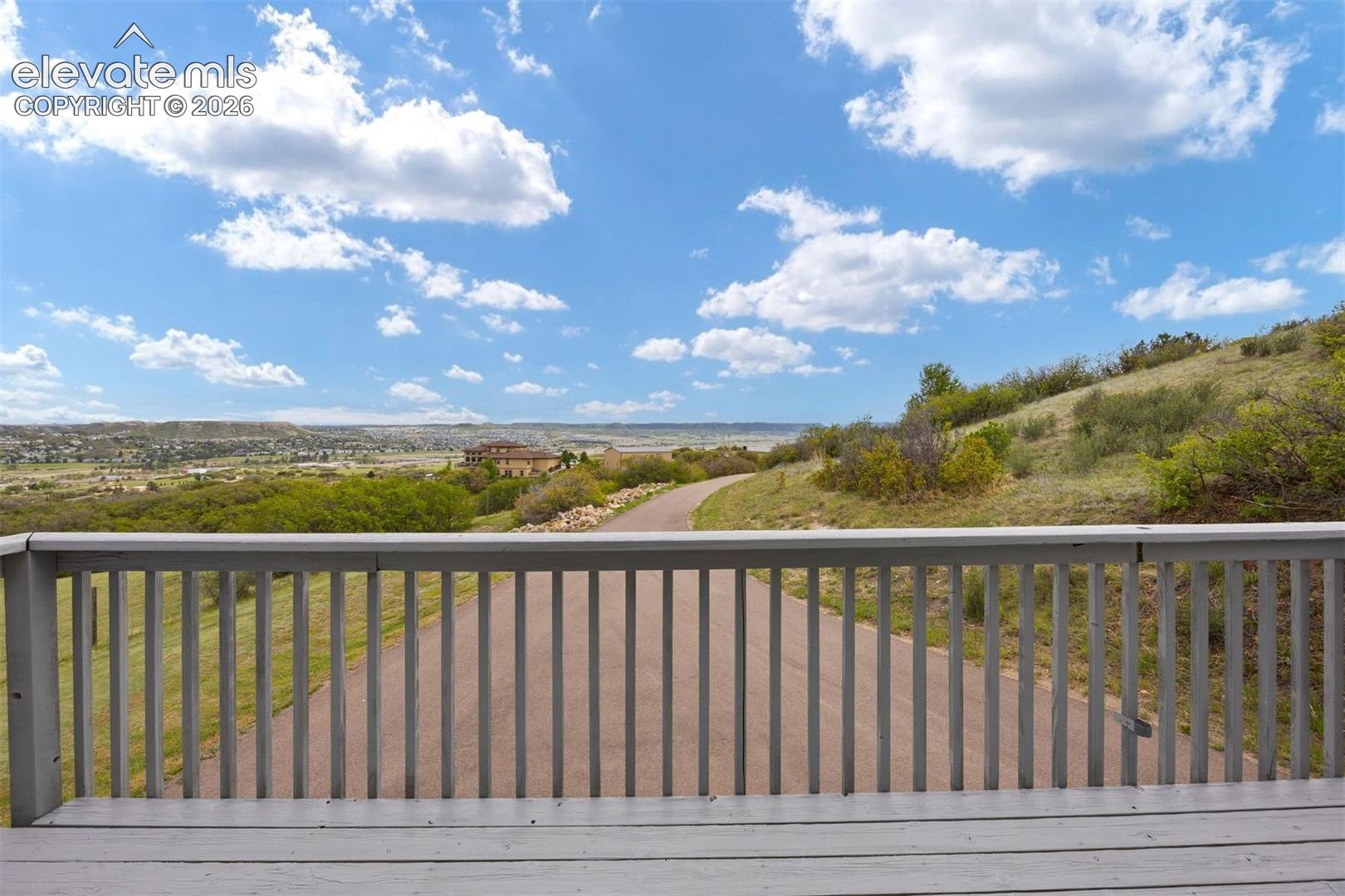 ADU deck with expansive south-facing views of Castle Rock, the valley, and rolling open space.