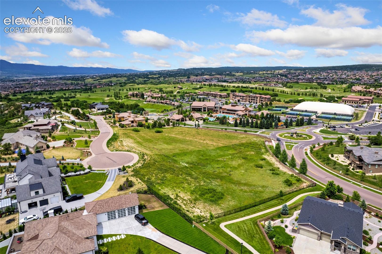 Mountain views on a private, gated cul-de-sac 1.56 acre lot.  