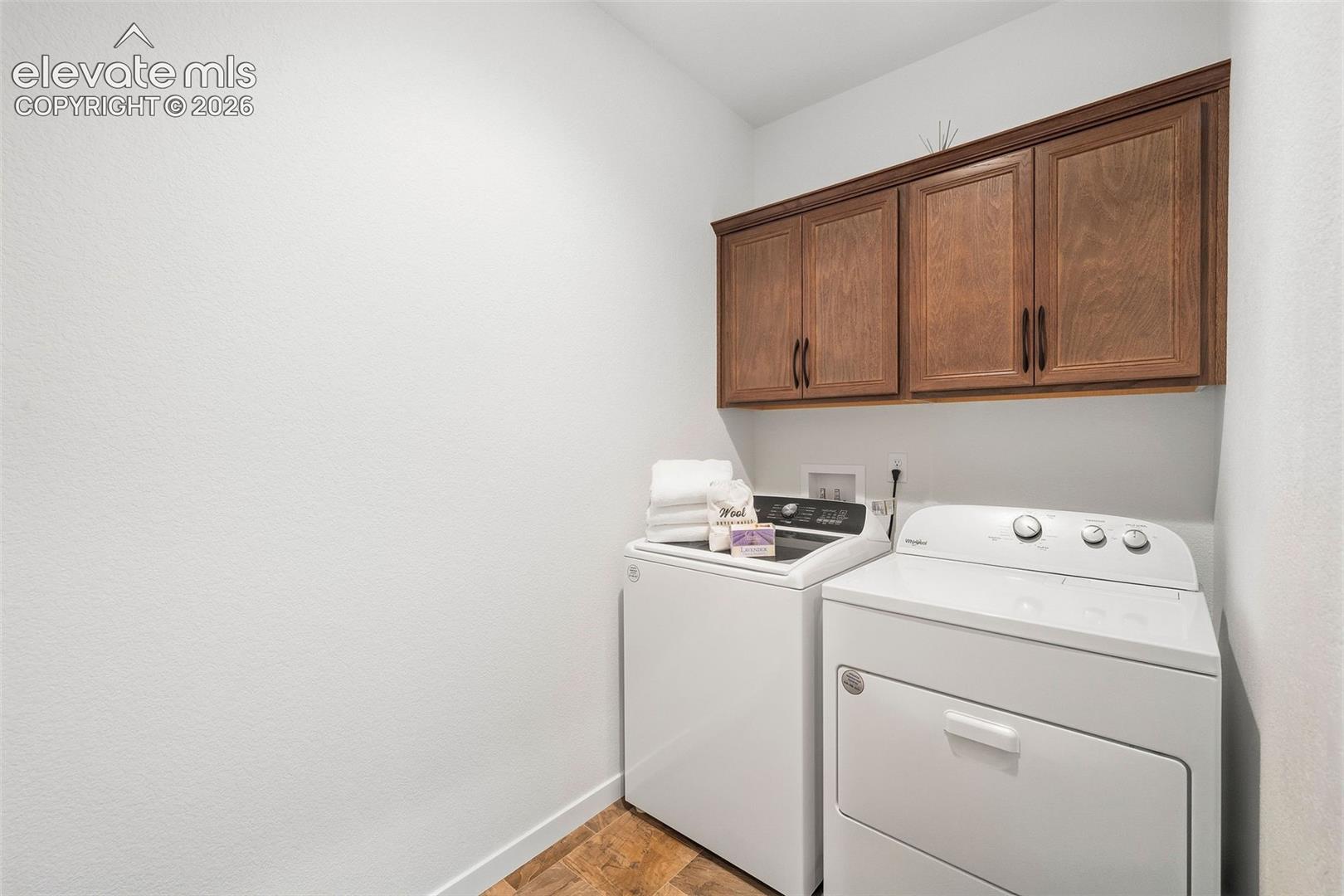 The main-level laundry room is generously sized. 