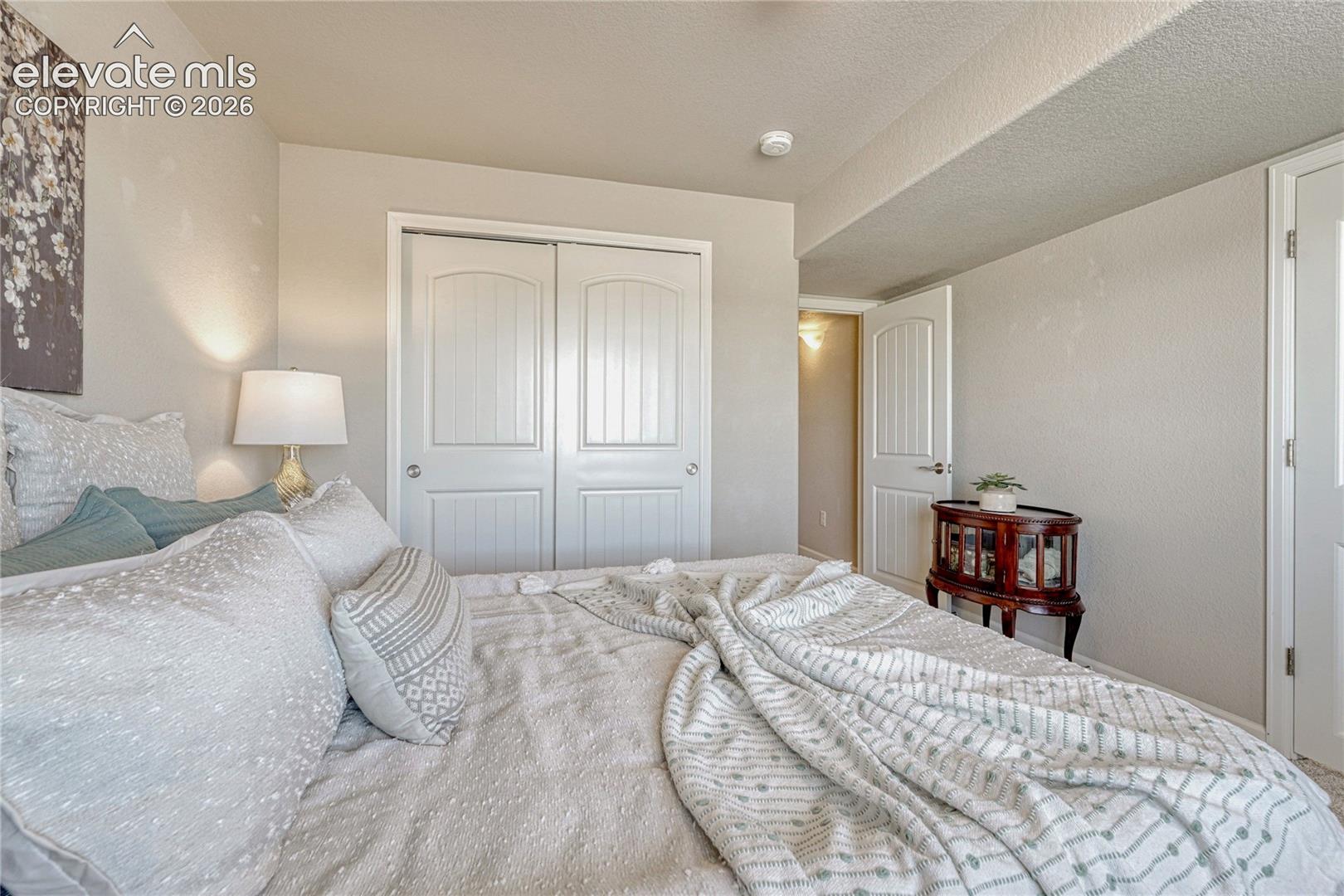 The basement bedroom provides an ideal space for family members, guests, or additional living flexibility.