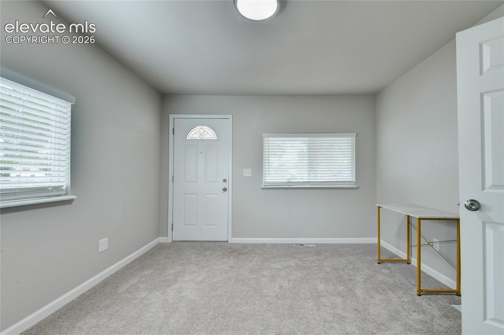 Bedroom w/ separate front entry