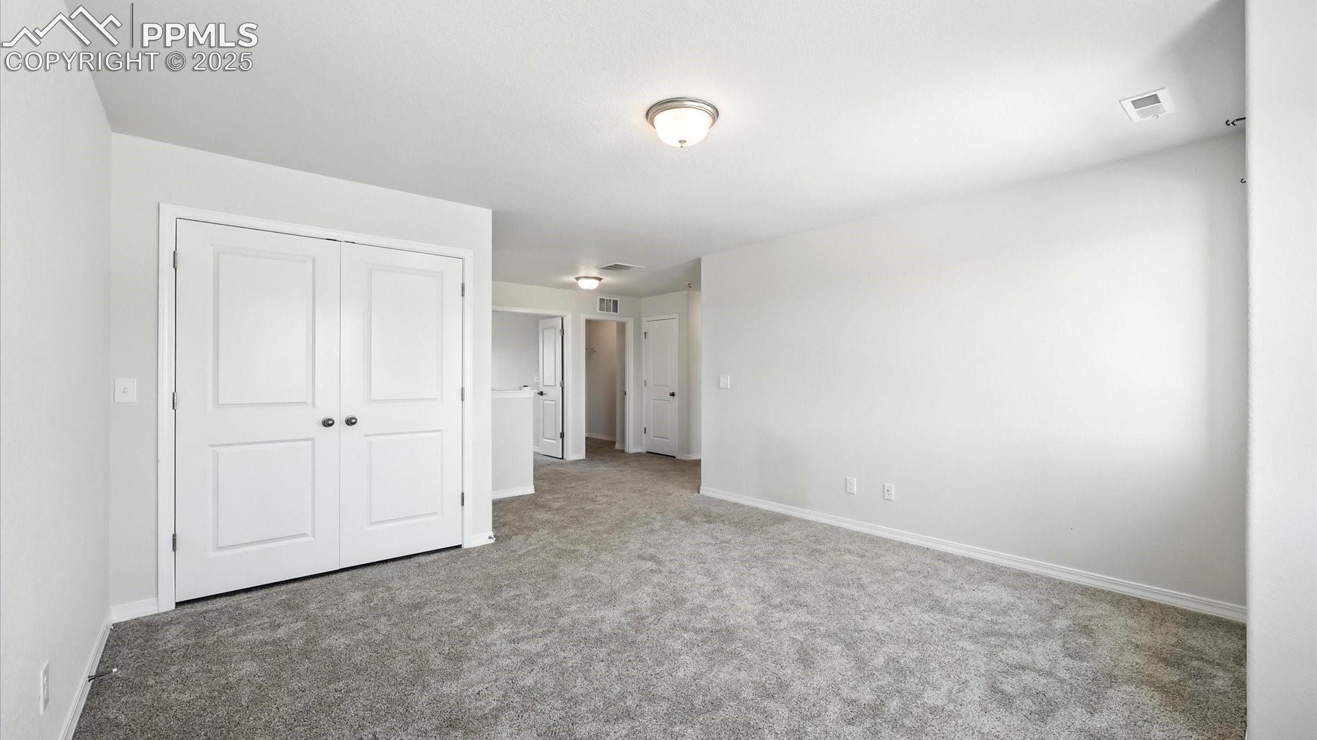 View into the upper level Bedrooms from the Loft.