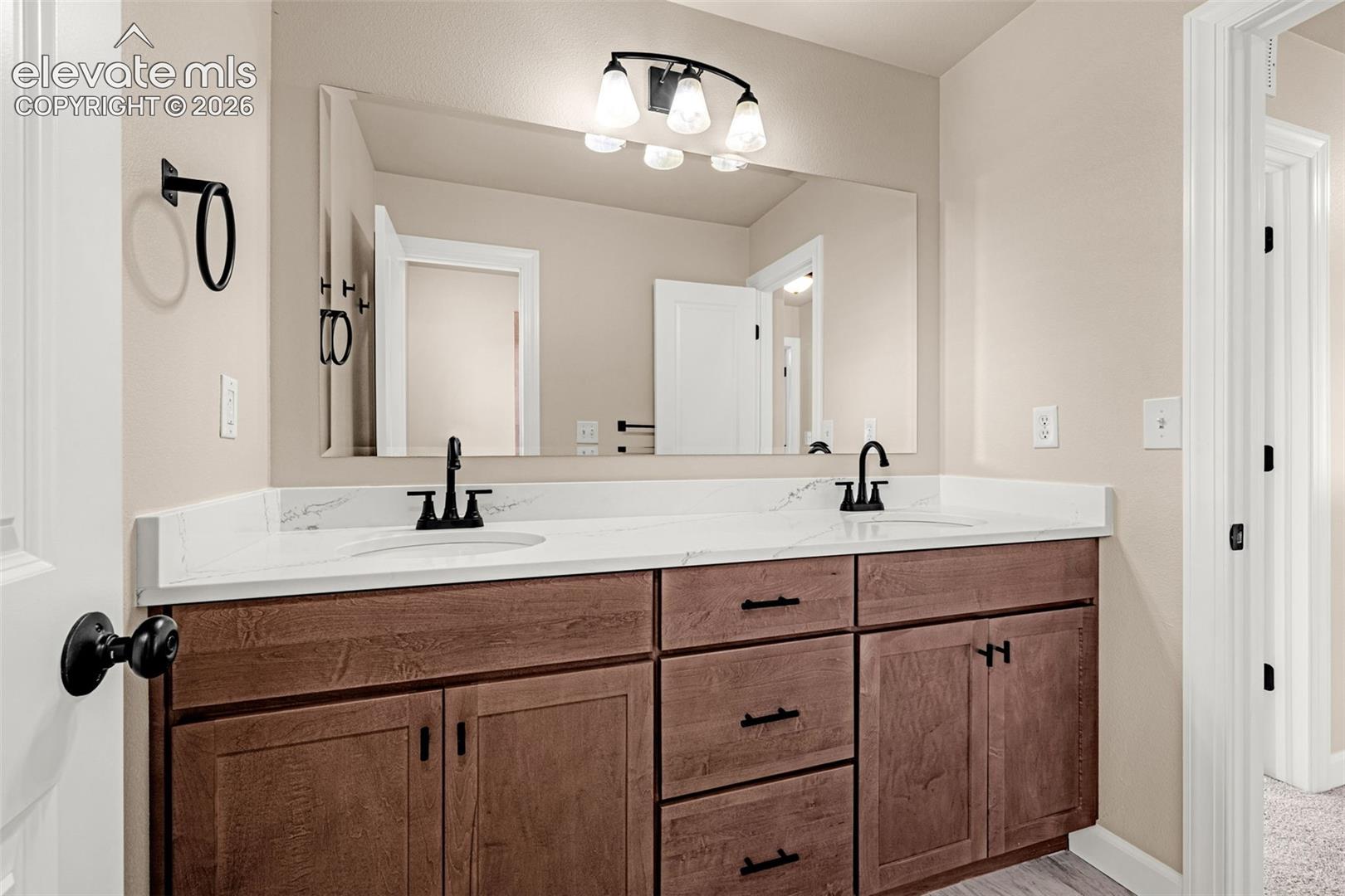 Fully remodeled bathroom.  New cabinets, flooring, lights, fixtures.  