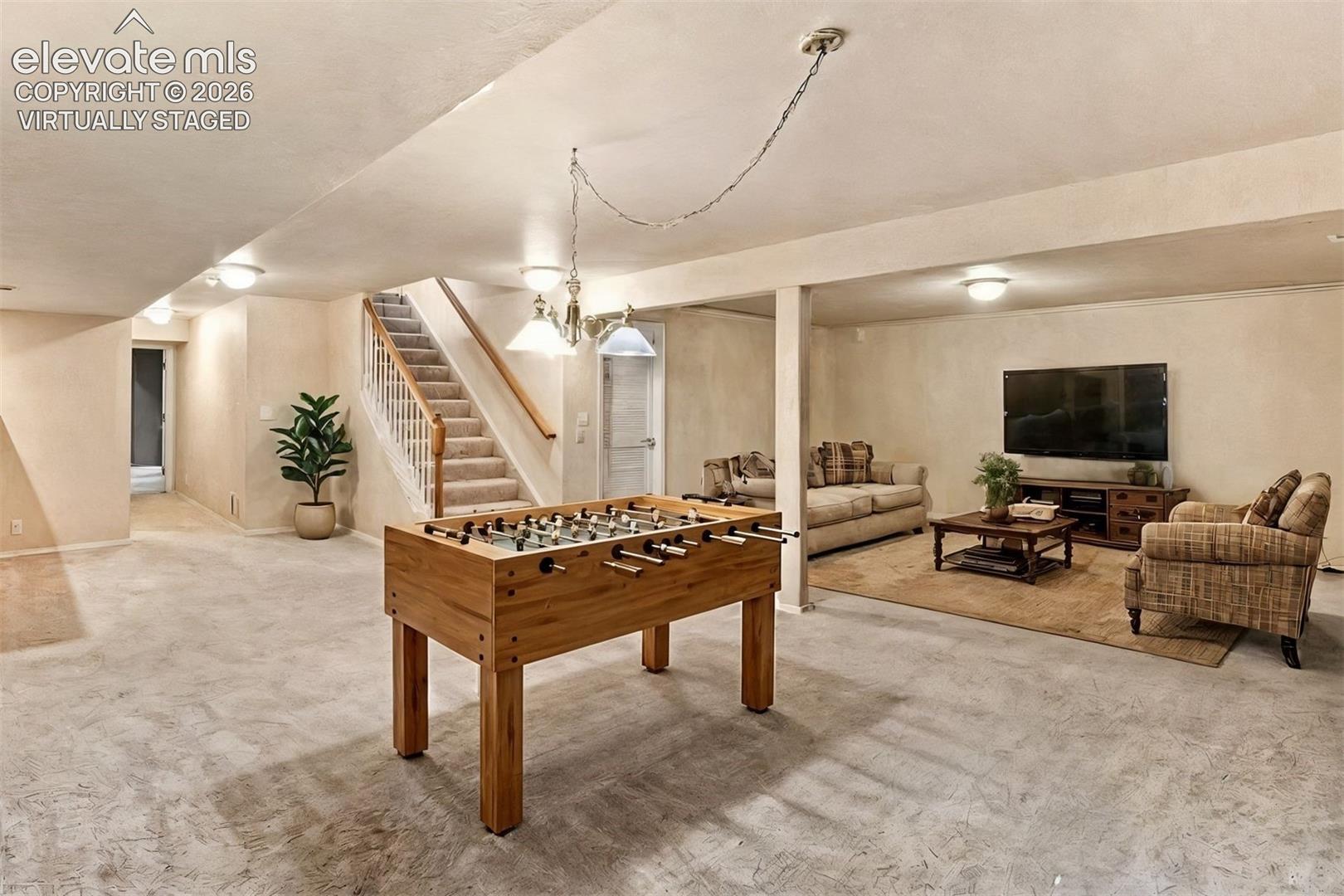 virtually staged* Basement family room, great for entertaining!