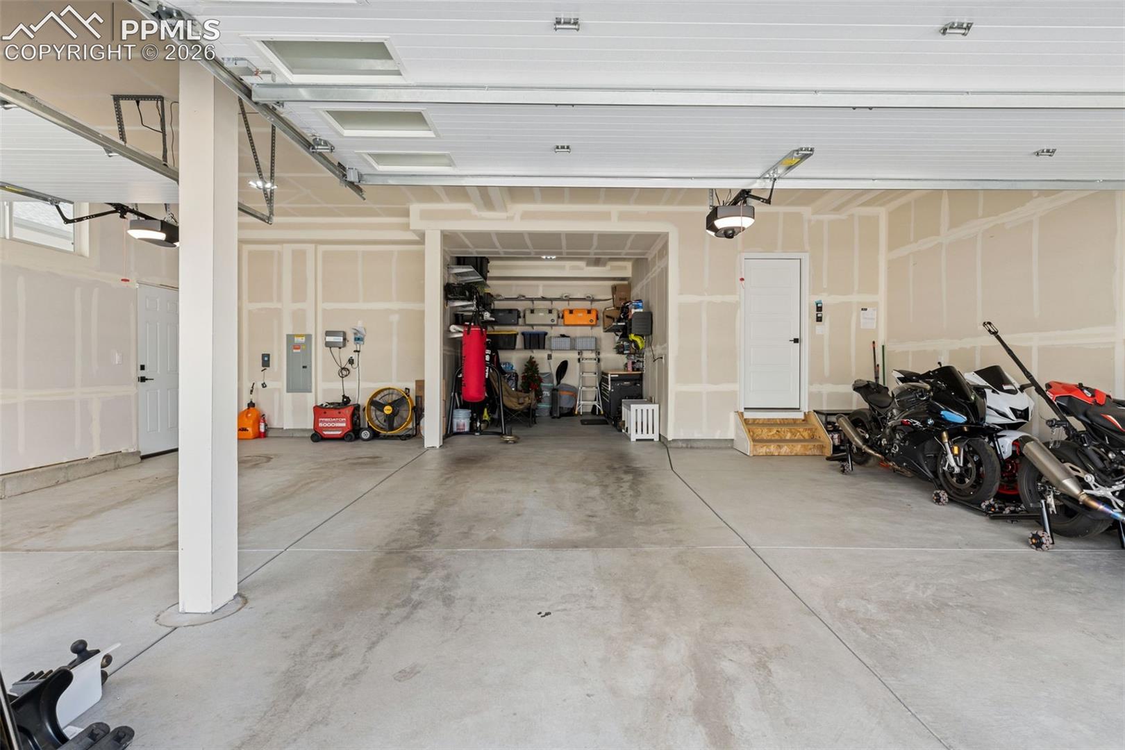 Massive Four Car Garage w/Tandem 4th Bath