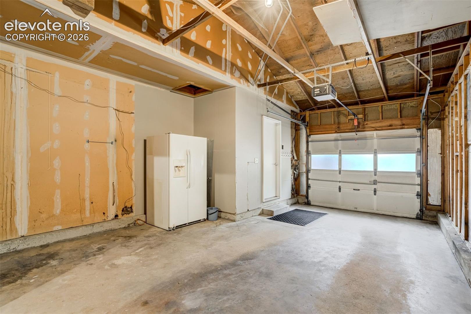Oversized one car garage located on the front of the house.