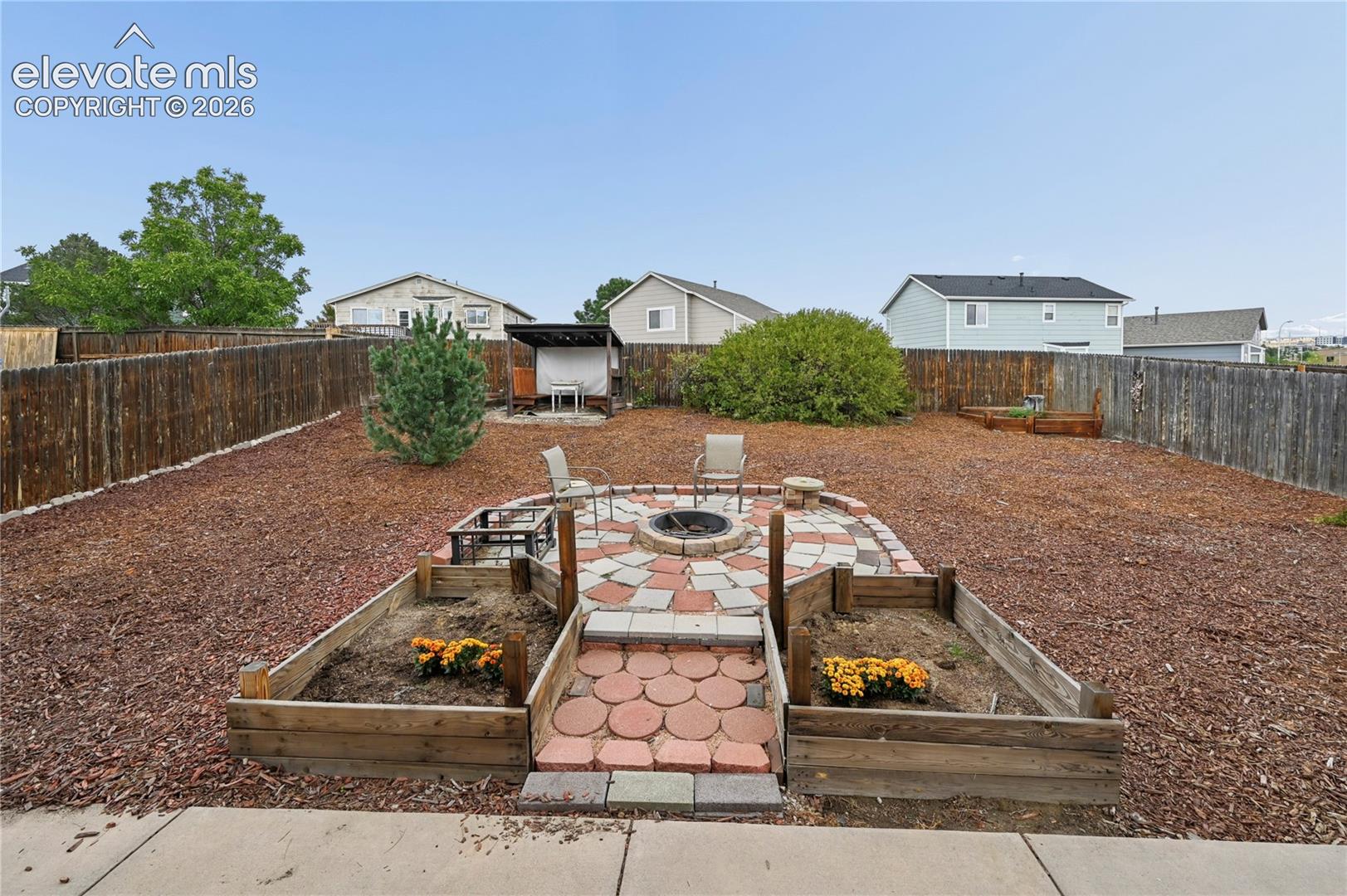 Patios and large back yard just outside the dining room