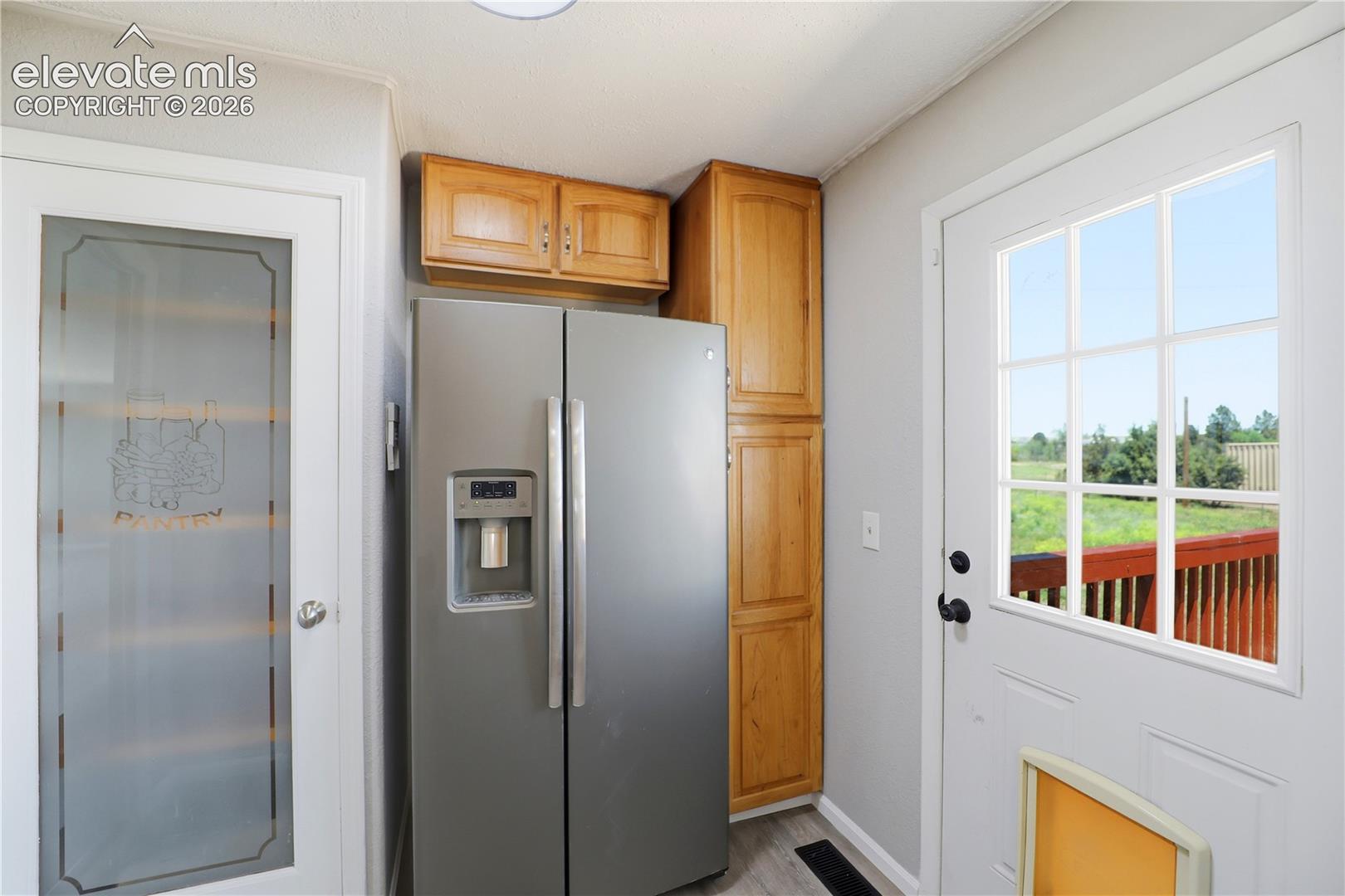 Mud Space, Pantry, Fridge, Extra Cabinets