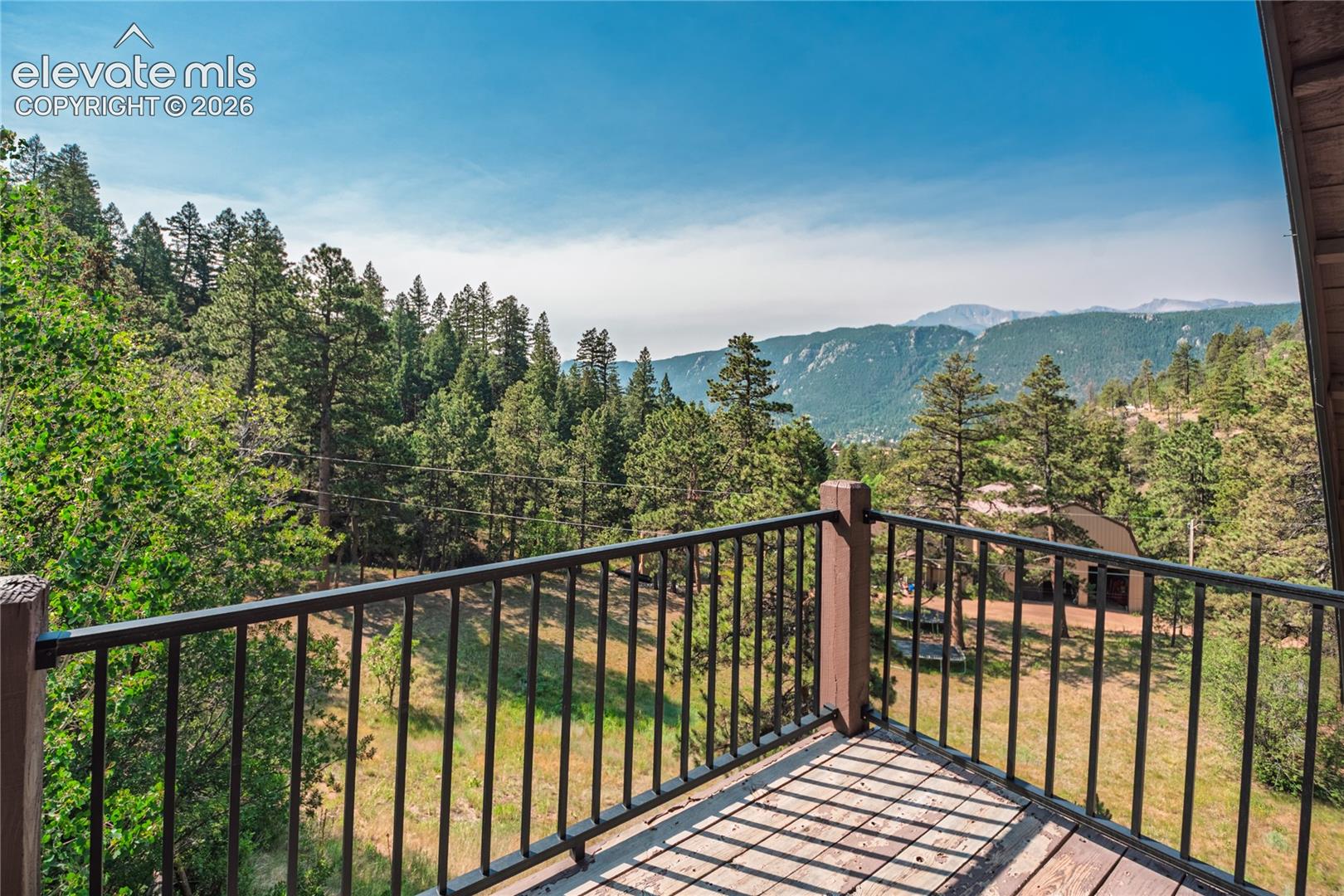 Upstairs balcony view- incredible view of Pikes Peak!