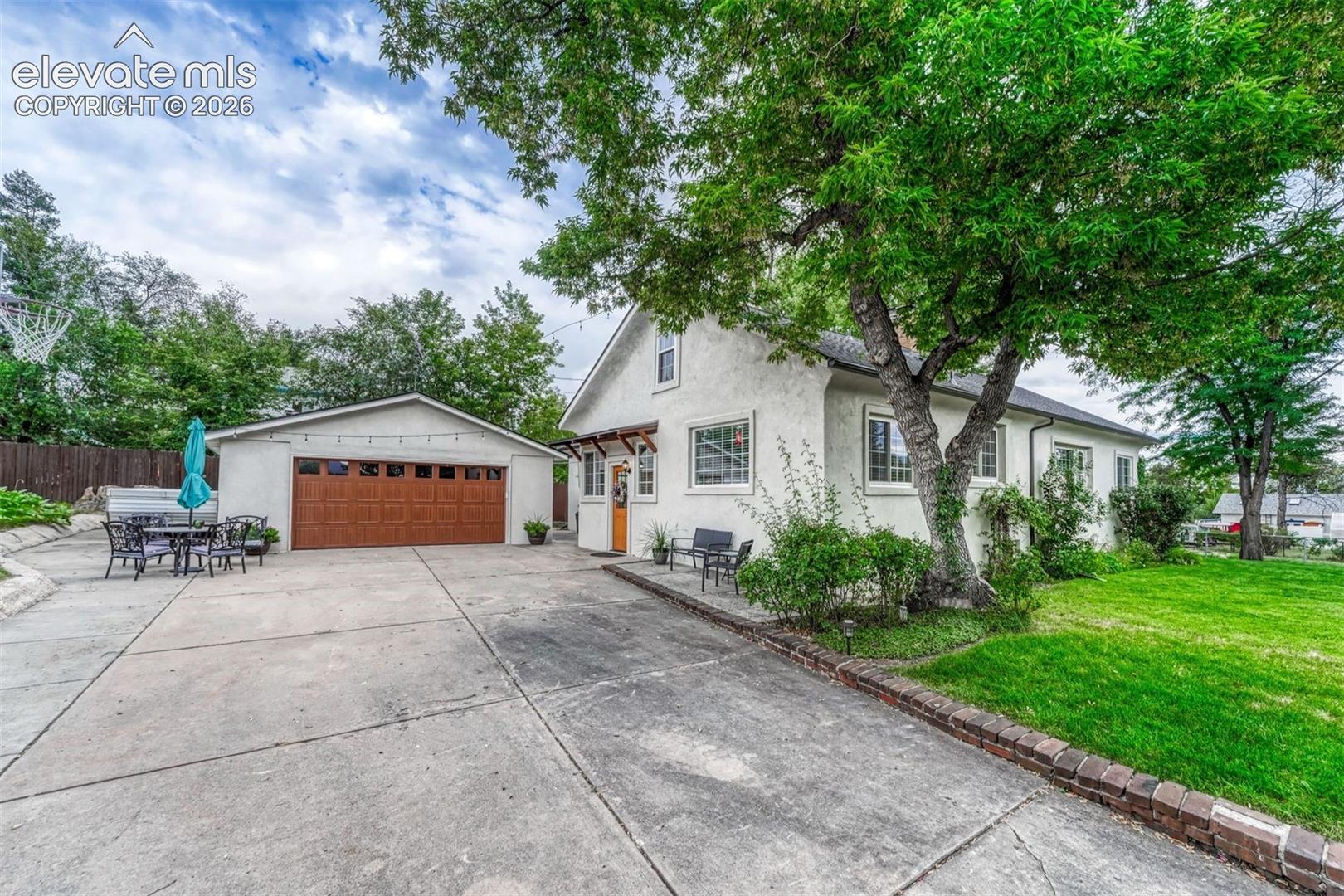 Two-Car Detached Garage with huge driveway.