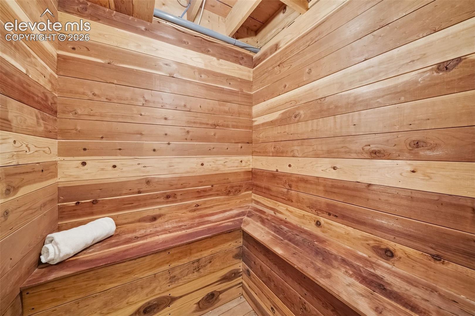 Dry sauna adding a unique wellness retreat and extra versatility to the lower level