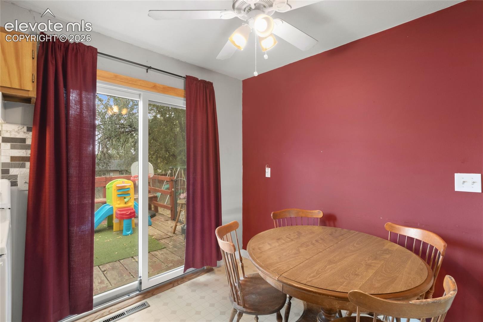 Dining area with walkout to deck