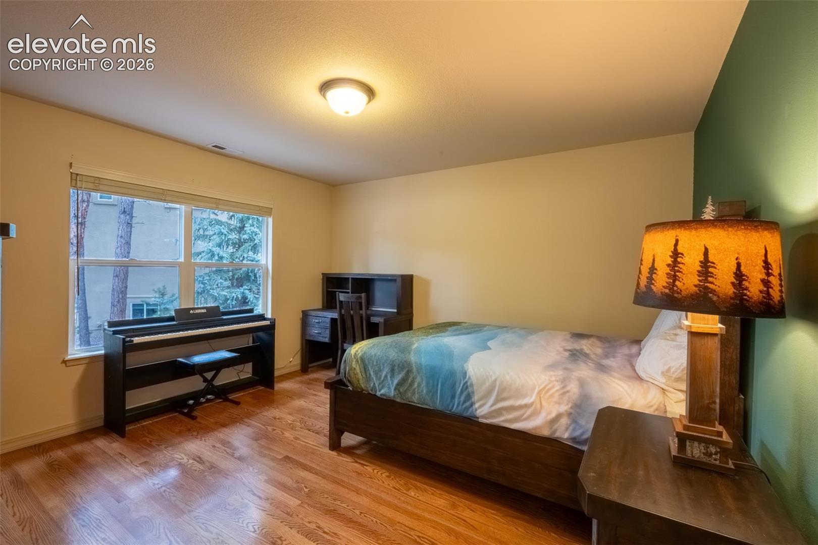 Bedroom 2 with walk in closet and attached full Jack and Jill bath (3) - upper level