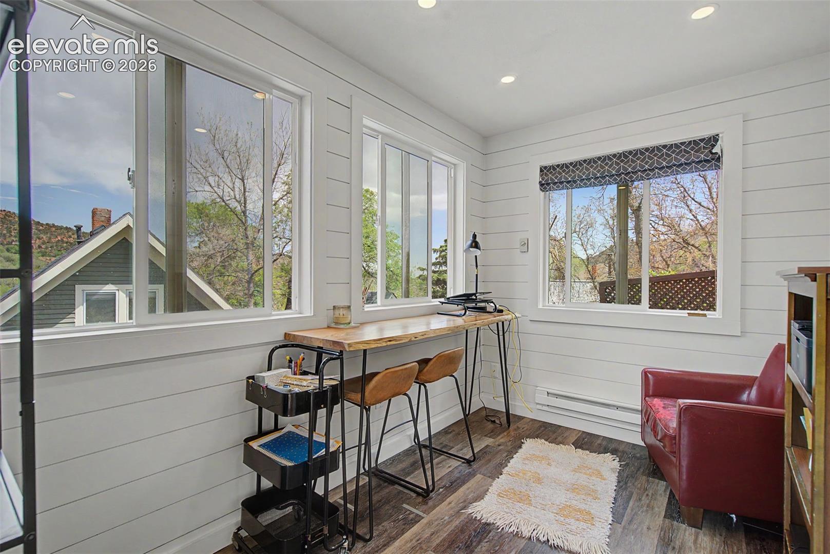 Creative studio in backyard with electricity and baseboard heating.