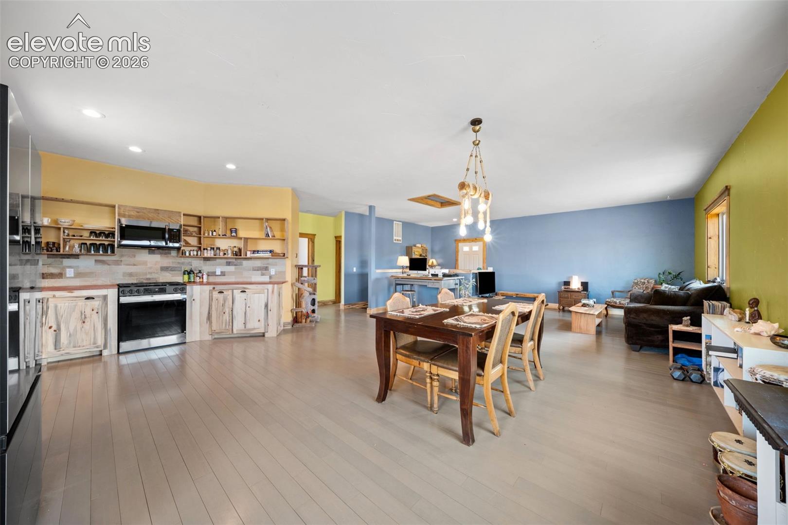 Spacious dining area opens seamlessly to the kitchen.