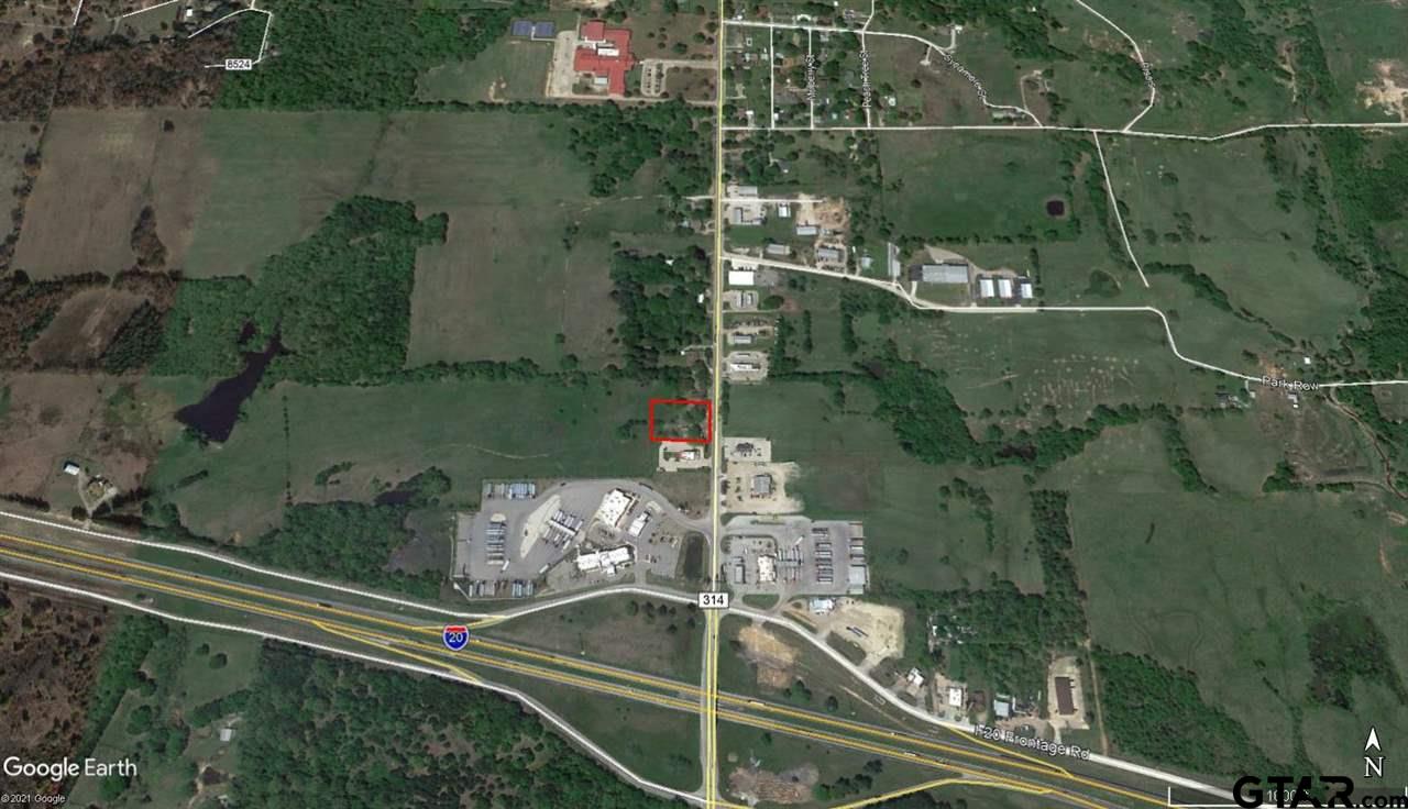 Aerial view of a marked parcel beside Highway 314 near Interstate 20, surrounded by fields and businesses.