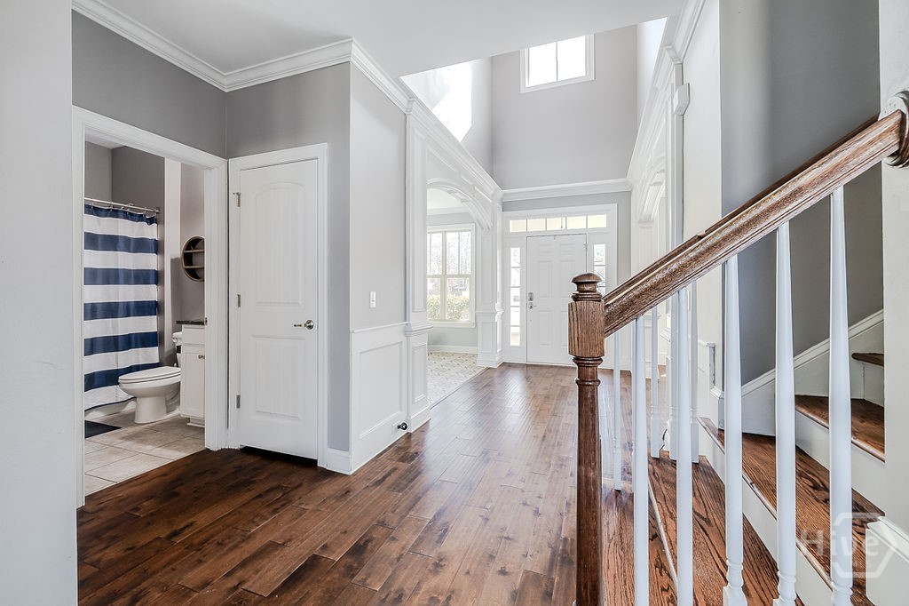 Foyer, stairwell and full bath
