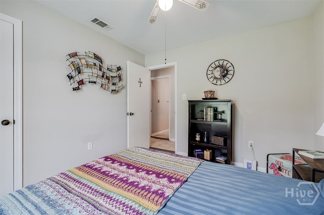 This bedroom is 10'11 X 10'1