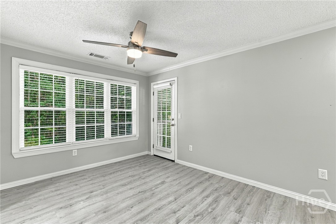 Sunroom Leads to Covered Balcony