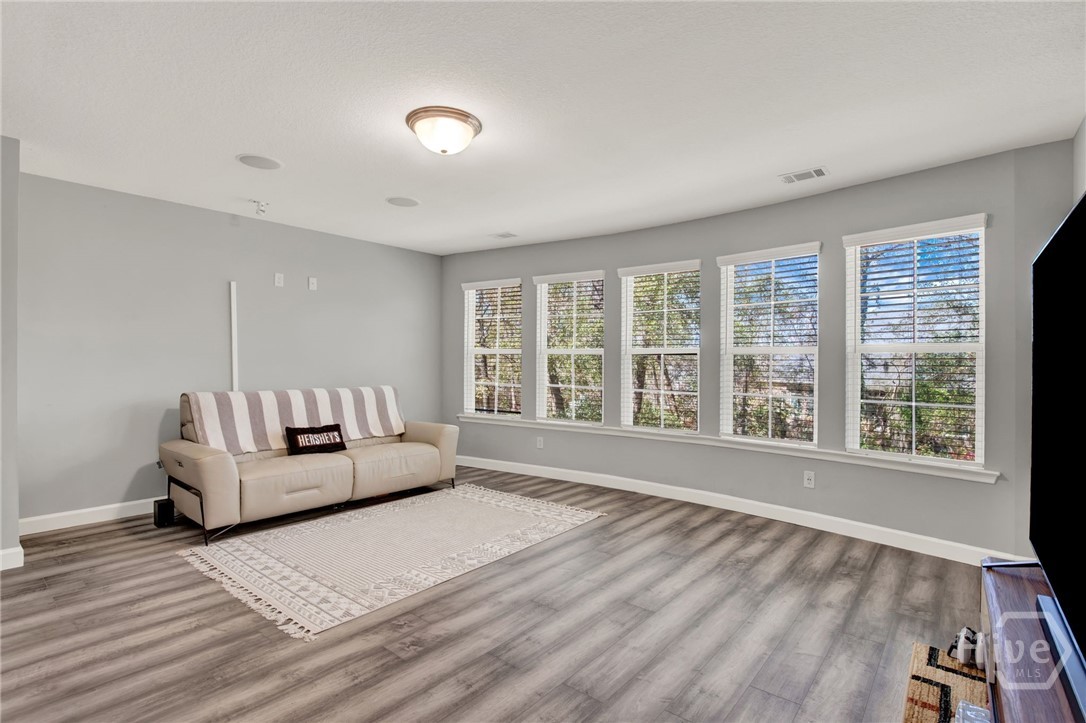 Bonus Room with Curved Wall of Windows