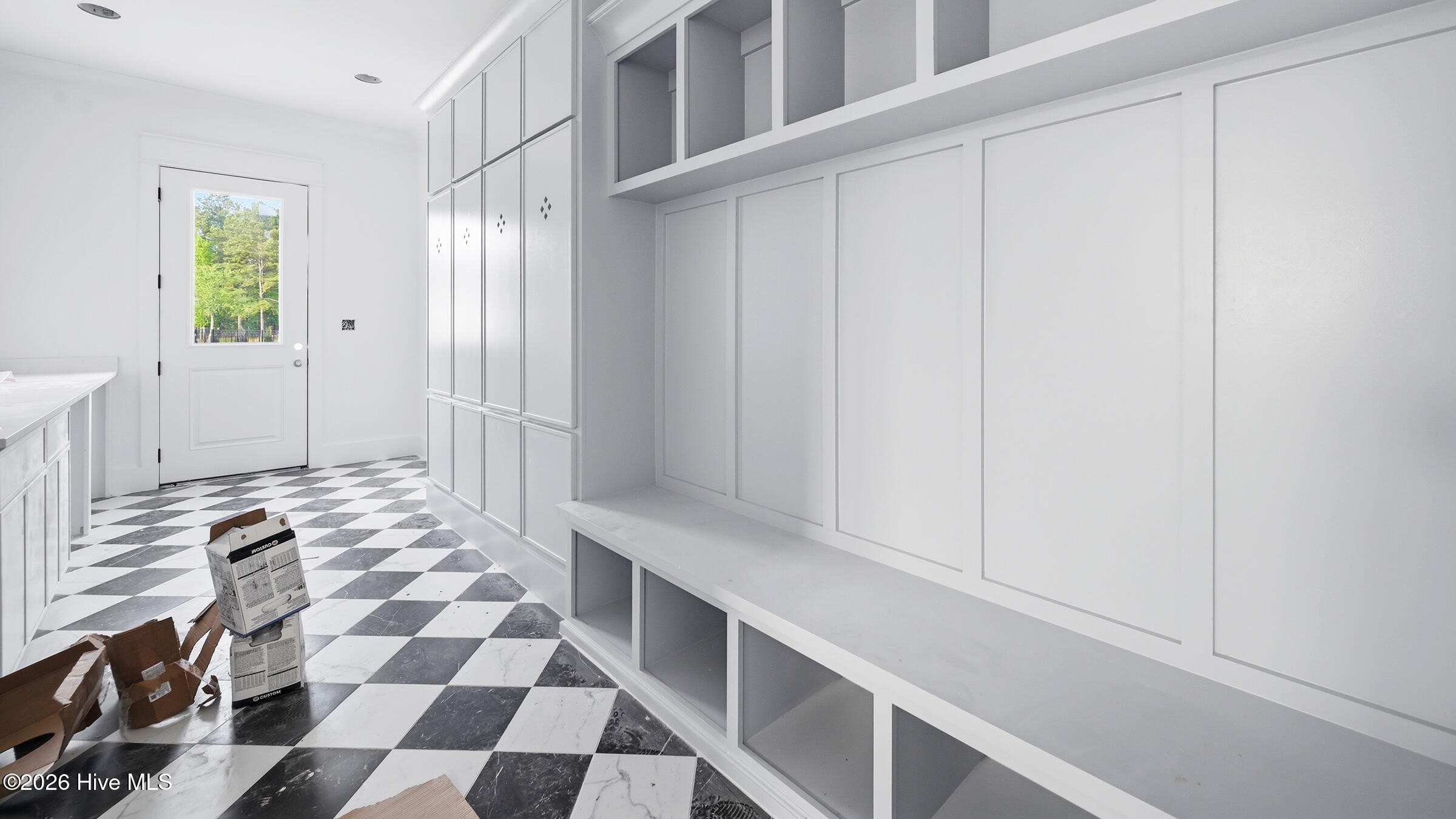 Can we talk about this laundry room- drop zone with storage lockers !